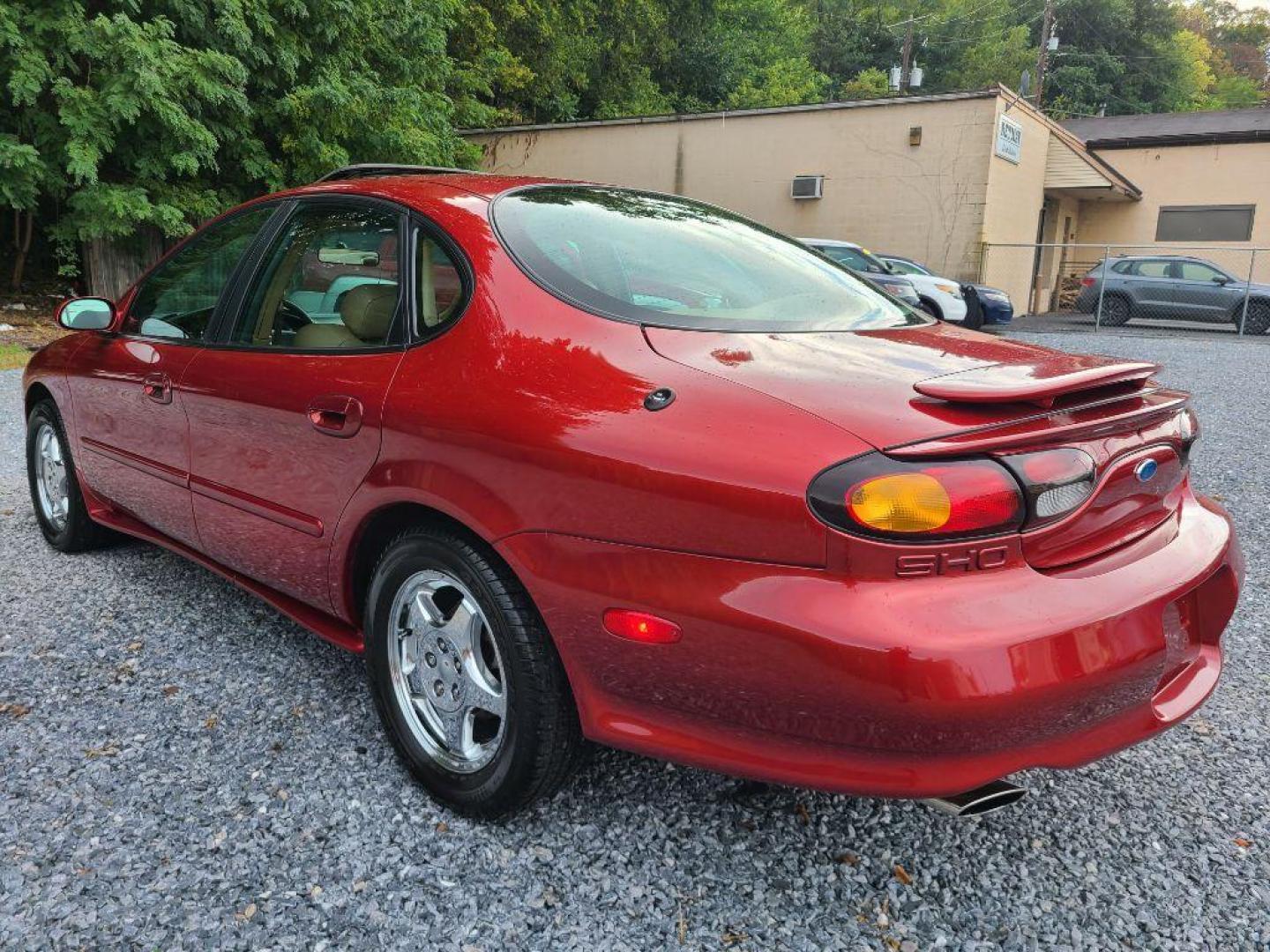 1996 RED FORD TAURUS SHO (1FALP54N4TA) with an 3.4L engine, Automatic transmission, located at 117 North Cameron Street, Harrisburg, PA, 17101, (717) 963-8962, 40.267021, -76.875351 - WE FINANCE!!! Good Credit/ Bad Credit/ No Credit - ALL Trade-Ins Welcomed!!! ***Guaranteed Credit Approval*** APPLY ONLINE or CALL us TODAY ;) Internet Prices and Marketplace Prices are SPECIAL discounted ***CASH DEALS*** Retail Prices are higher. Please call us to discuss your cash and finan - Photo#3