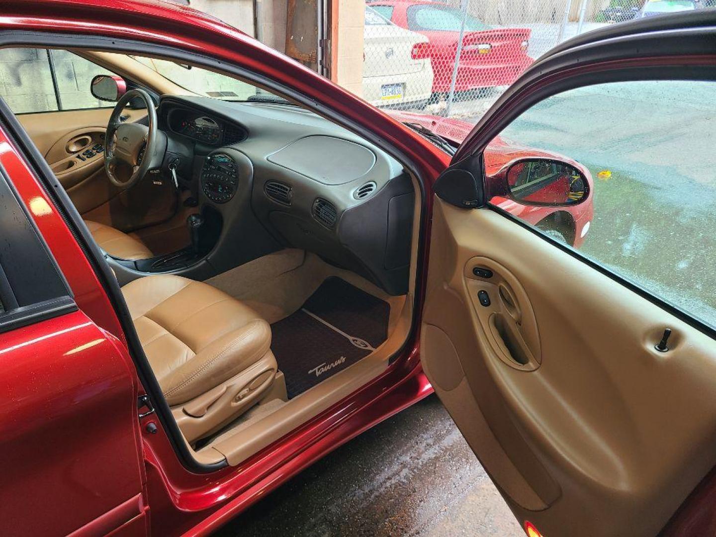 1996 RED FORD TAURUS SHO (1FALP54N4TA) with an 3.4L engine, Automatic transmission, located at 117 North Cameron Street, Harrisburg, PA, 17101, (717) 963-8962, 40.267021, -76.875351 - WE FINANCE!!! Good Credit/ Bad Credit/ No Credit - ALL Trade-Ins Welcomed!!! ***Guaranteed Credit Approval*** APPLY ONLINE or CALL us TODAY ;) Internet Prices and Marketplace Prices are SPECIAL discounted ***CASH DEALS*** Retail Prices are higher. Please call us to discuss your cash and finan - Photo#15