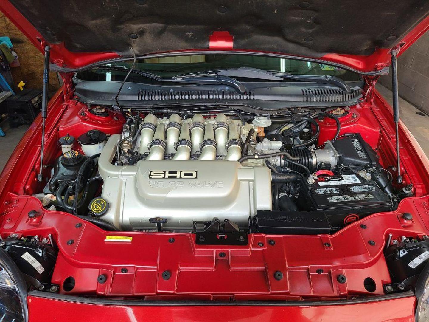 1996 RED FORD TAURUS SHO (1FALP54N4TA) with an 3.4L engine, Automatic transmission, located at 117 North Cameron Street, Harrisburg, PA, 17101, (717) 963-8962, 40.267021, -76.875351 - WE FINANCE!!! Good Credit/ Bad Credit/ No Credit - ALL Trade-Ins Welcomed!!! ***Guaranteed Credit Approval*** APPLY ONLINE or CALL us TODAY ;) Internet Prices and Marketplace Prices are SPECIAL discounted ***CASH DEALS*** Retail Prices are higher. Please call us to discuss your cash and finan - Photo#28