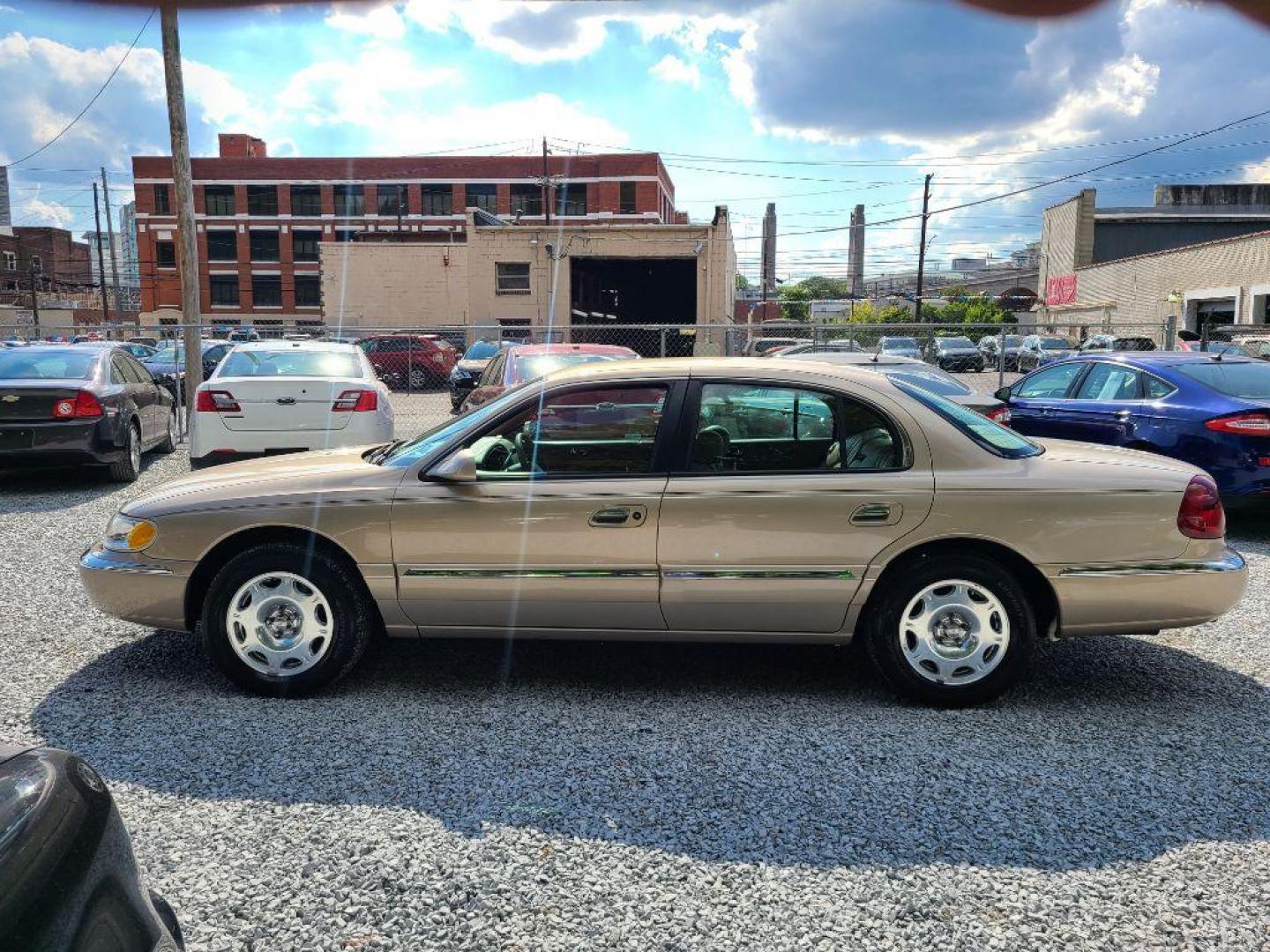 1998 BEIGE LINCOLN CONTINENTAL SEDAN (1LNFM97V7WY) with an 4.6L engine, Automatic transmission, located at 117 North Cameron Street, Harrisburg, PA, 17101, (717) 963-8962, 40.267021, -76.875351 - WE FINANCE!!! Good Credit/ Bad Credit/ No Credit - ALL Trade-Ins Welcomed!!! ***Guaranteed Credit Approval*** APPLY ONLINE or CALL us TODAY ;) Internet Prices and Marketplace Prices are SPECIAL discounted ***CASH DEALS*** Retail Prices are higher. Please call us to discuss your cash and finan - Photo#1