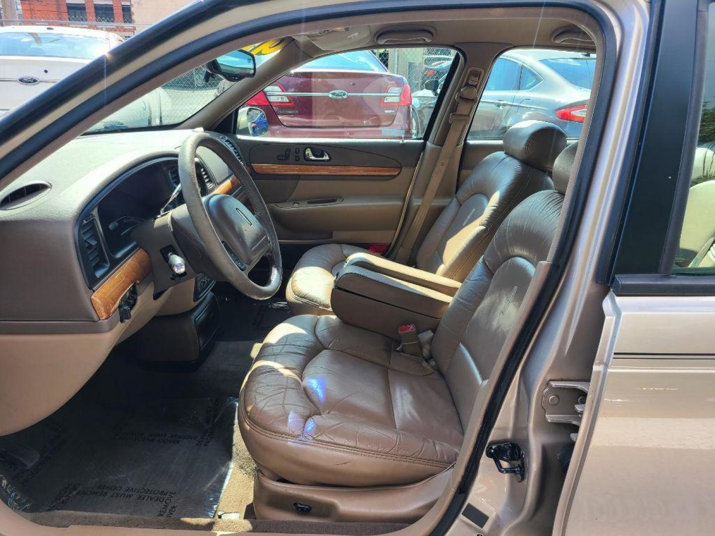 1998 BEIGE LINCOLN CONTINENTAL SEDAN (1LNFM97V7WY) with an 4.6L engine, Automatic transmission, located at 117 North Cameron Street, Harrisburg, PA, 17101, (717) 963-8962, 40.267021, -76.875351 - WE FINANCE!!! Good Credit/ Bad Credit/ No Credit - ALL Trade-Ins Welcomed!!! ***Guaranteed Credit Approval*** APPLY ONLINE or CALL us TODAY ;) Internet Prices and Marketplace Prices are SPECIAL discounted ***CASH DEALS*** Retail Prices are higher. Please call us to discuss your cash and finan - Photo#12
