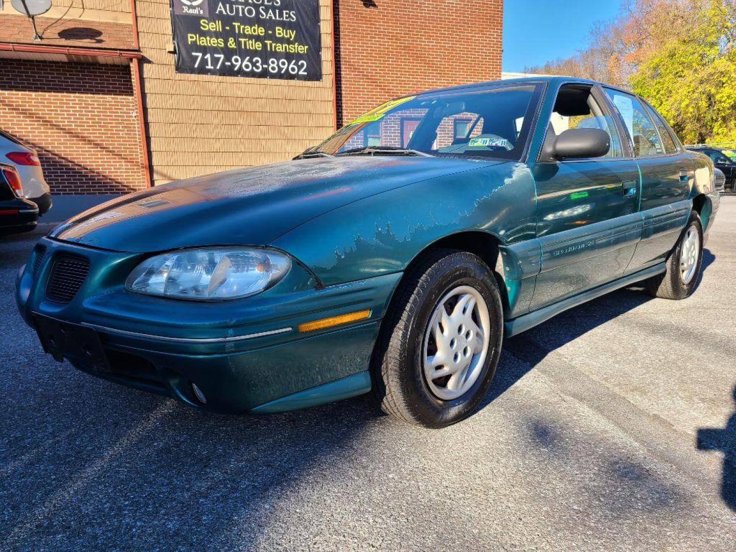 1998 GREEN PONTIAC GRAND AM SE (1G2NE52T4WM) with an 2.4L engine, Automatic transmission, located at 117 North Cameron Street, Harrisburg, PA, 17101, (717) 963-8962, 40.267021, -76.875351 - WE FINANCE!!! Good Credit/ Bad Credit/ No Credit - ALL Trade-Ins Welcomed!!! ***Guaranteed Credit Approval*** APPLY ONLINE or CALL us TODAY ;) Internet Prices and Marketplace Prices are SPECIAL discounted ***CASH DEALS*** Retail Prices are higher. Please call us to discuss your cash and finan - Photo#0