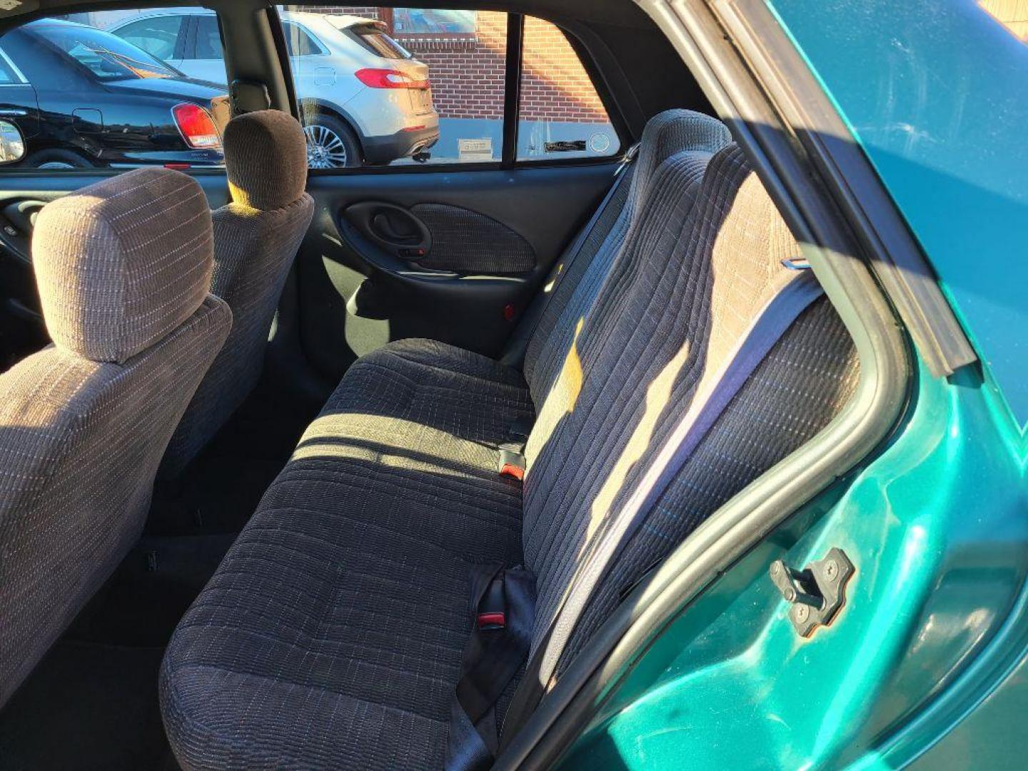 1998 GREEN PONTIAC GRAND AM SE (1G2NE52T4WM) with an 2.4L engine, Automatic transmission, located at 117 North Cameron Street, Harrisburg, PA, 17101, (717) 963-8962, 40.267021, -76.875351 - WE FINANCE!!! Good Credit/ Bad Credit/ No Credit - ALL Trade-Ins Welcomed!!! ***Guaranteed Credit Approval*** APPLY ONLINE or CALL us TODAY ;) Internet Prices and Marketplace Prices are SPECIAL discounted ***CASH DEALS*** Retail Prices are higher. Please call us to discuss your cash and finan - Photo#11