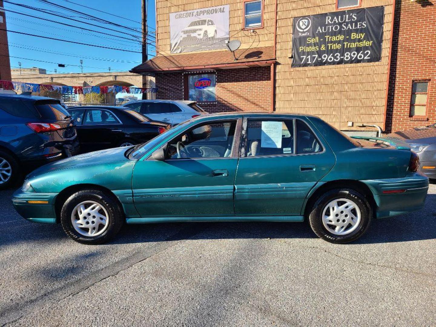 1998 GREEN PONTIAC GRAND AM SE (1G2NE52T4WM) with an 2.4L engine, Automatic transmission, located at 117 North Cameron Street, Harrisburg, PA, 17101, (717) 963-8962, 40.267021, -76.875351 - WE FINANCE!!! Good Credit/ Bad Credit/ No Credit - ALL Trade-Ins Welcomed!!! ***Guaranteed Credit Approval*** APPLY ONLINE or CALL us TODAY ;) Internet Prices and Marketplace Prices are SPECIAL discounted ***CASH DEALS*** Retail Prices are higher. Please call us to discuss your cash and finan - Photo#1