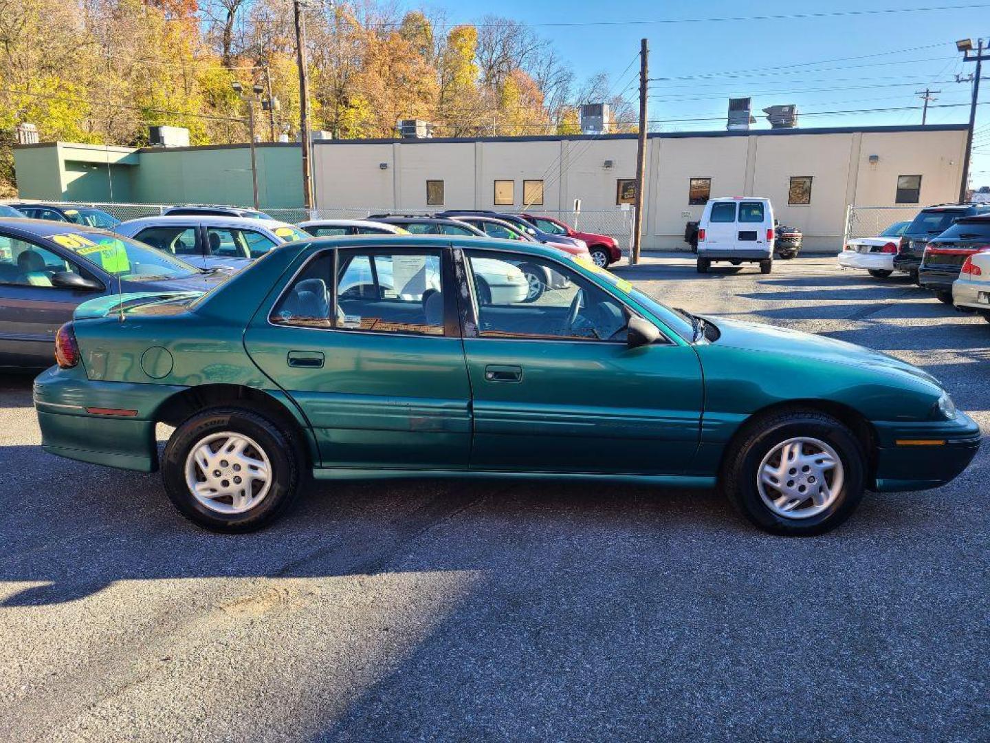 1998 GREEN PONTIAC GRAND AM SE (1G2NE52T4WM) with an 2.4L engine, Automatic transmission, located at 117 North Cameron Street, Harrisburg, PA, 17101, (717) 963-8962, 40.267021, -76.875351 - WE FINANCE!!! Good Credit/ Bad Credit/ No Credit - ALL Trade-Ins Welcomed!!! ***Guaranteed Credit Approval*** APPLY ONLINE or CALL us TODAY ;) Internet Prices and Marketplace Prices are SPECIAL discounted ***CASH DEALS*** Retail Prices are higher. Please call us to discuss your cash and finan - Photo#5