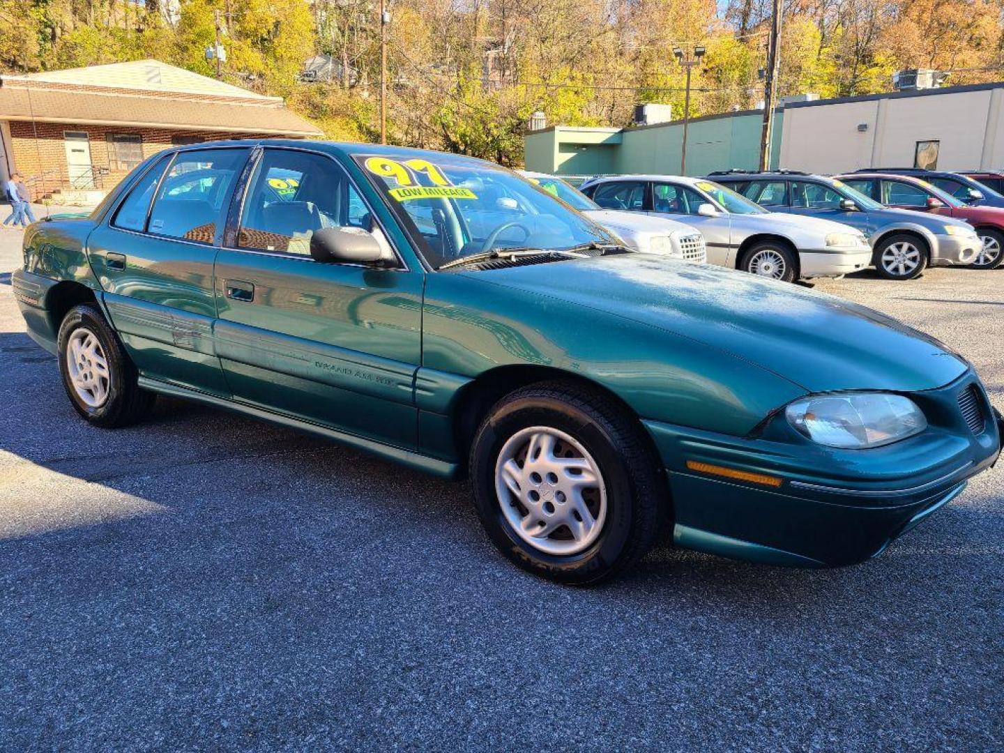 1998 GREEN PONTIAC GRAND AM SE (1G2NE52T4WM) with an 2.4L engine, Automatic transmission, located at 117 North Cameron Street, Harrisburg, PA, 17101, (717) 963-8962, 40.267021, -76.875351 - WE FINANCE!!! Good Credit/ Bad Credit/ No Credit - ALL Trade-Ins Welcomed!!! ***Guaranteed Credit Approval*** APPLY ONLINE or CALL us TODAY ;) Internet Prices and Marketplace Prices are SPECIAL discounted ***CASH DEALS*** Retail Prices are higher. Please call us to discuss your cash and finan - Photo#6
