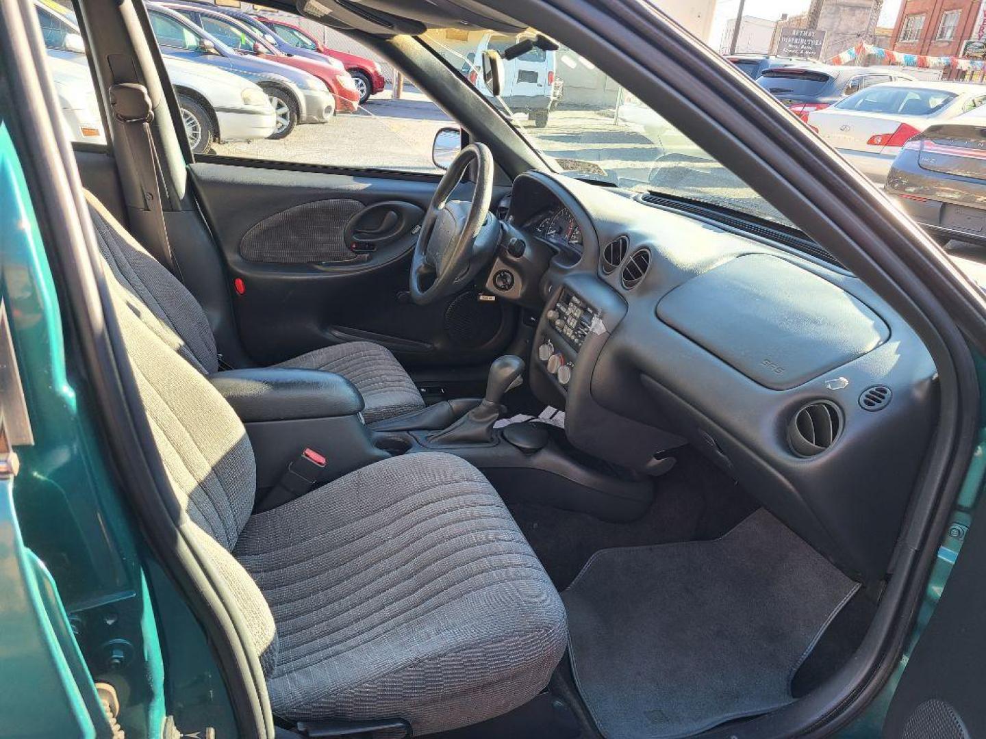 1998 GREEN PONTIAC GRAND AM SE (1G2NE52T4WM) with an 2.4L engine, Automatic transmission, located at 117 North Cameron Street, Harrisburg, PA, 17101, (717) 963-8962, 40.267021, -76.875351 - WE FINANCE!!! Good Credit/ Bad Credit/ No Credit - ALL Trade-Ins Welcomed!!! ***Guaranteed Credit Approval*** APPLY ONLINE or CALL us TODAY ;) Internet Prices and Marketplace Prices are SPECIAL discounted ***CASH DEALS*** Retail Prices are higher. Please call us to discuss your cash and finan - Photo#8