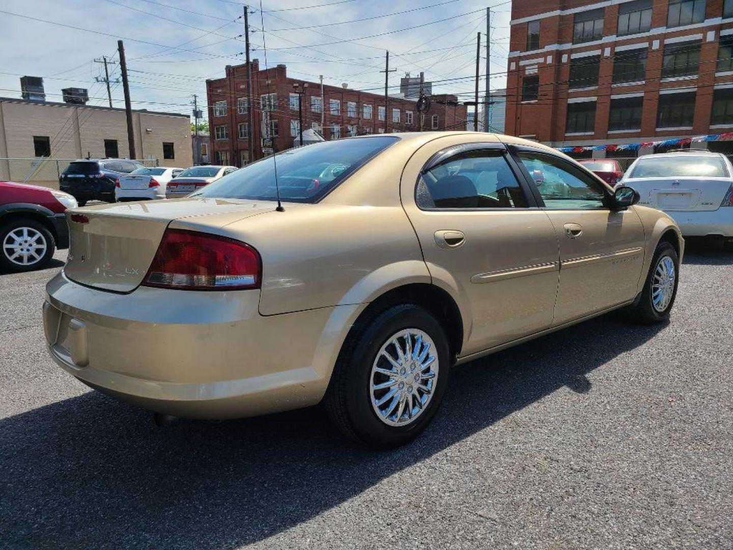 2001 TAN CHRYSLER SEBRING LX (1C3EL46X01N) with an 2.4L engine, Automatic transmission, located at 117 North Cameron Street, Harrisburg, PA, 17101, (717) 963-8962, 40.267021, -76.875351 - WE FINANCE!!! Good Credit/ Bad Credit/ No Credit - ALL Trade-Ins Welcomed!!! ***Guaranteed Credit Approval*** APPLY ONLINE or CALL us TODAY ;) Internet Prices and Marketplace Prices are SPECIAL discounted ***CASH DEALS*** Retail Prices are higher. Please call us to discuss your cash and finan - Photo#4