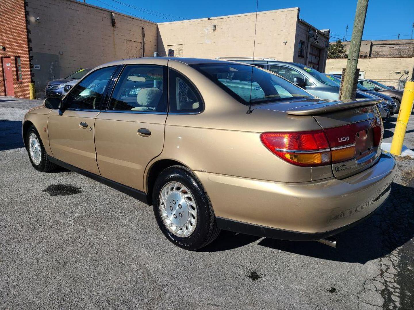 2002 GOLD SATURN L100 SEDAN (1G8JS54F72Y) with an 2.2L engine, Automatic transmission, located at 117 North Cameron Street, Harrisburg, PA, 17101, (717) 963-8962, 40.267021, -76.875351 - Photo#2