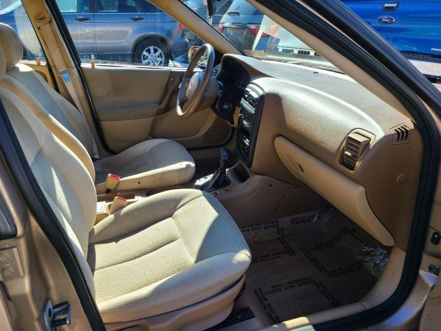 2002 GOLD SATURN L100 SEDAN (1G8JS54F72Y) with an 2.2L engine, Automatic transmission, located at 117 North Cameron Street, Harrisburg, PA, 17101, (717) 963-8962, 40.267021, -76.875351 - Photo#8