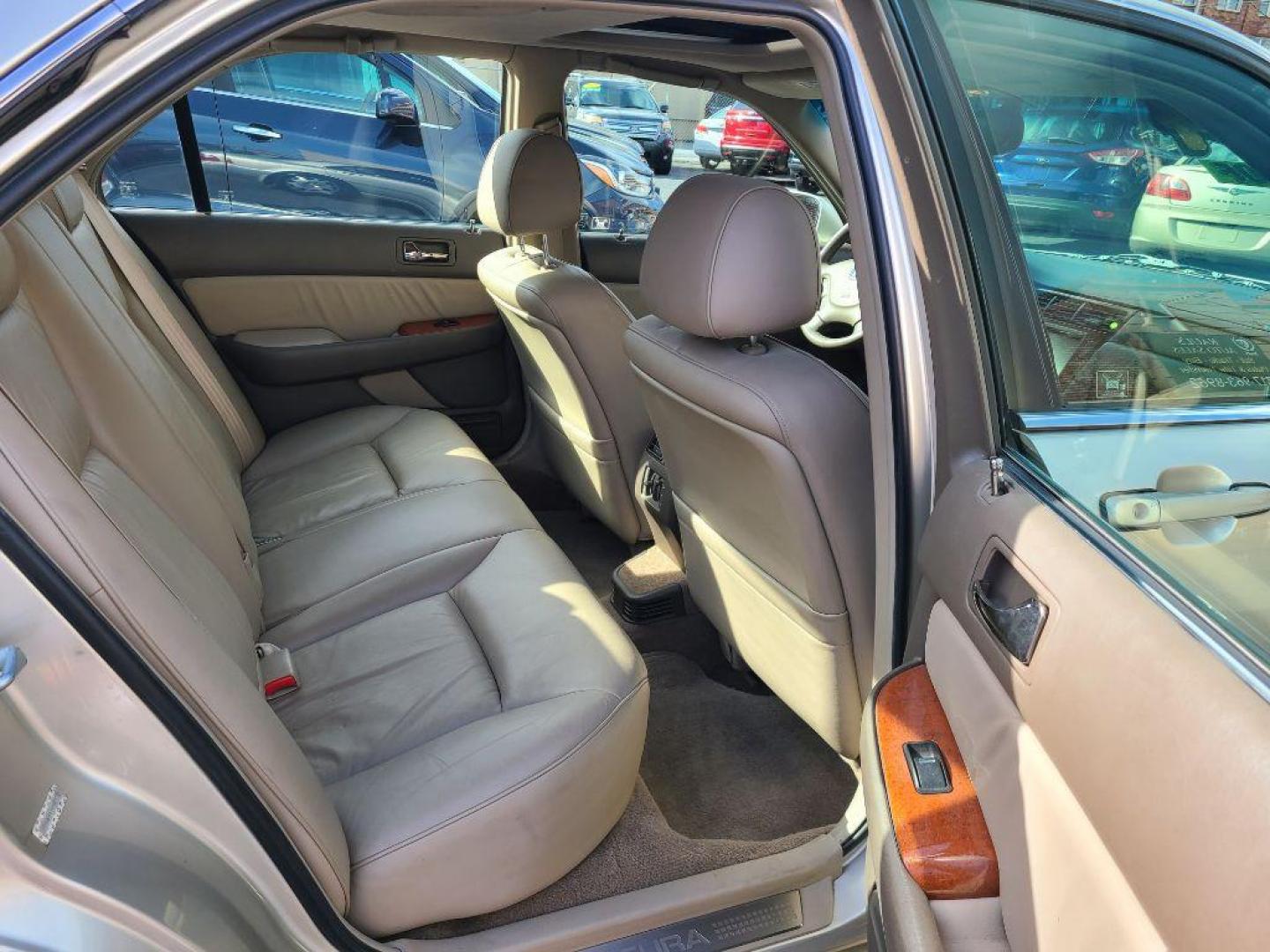 2004 GOLD ACURA 3.5RL SEDAN W/NAV (JH4KA96694C) with an 3.5L engine, Automatic transmission, located at 117 North Cameron Street, Harrisburg, PA, 17101, (717) 963-8962, 40.267021, -76.875351 - Photo#9