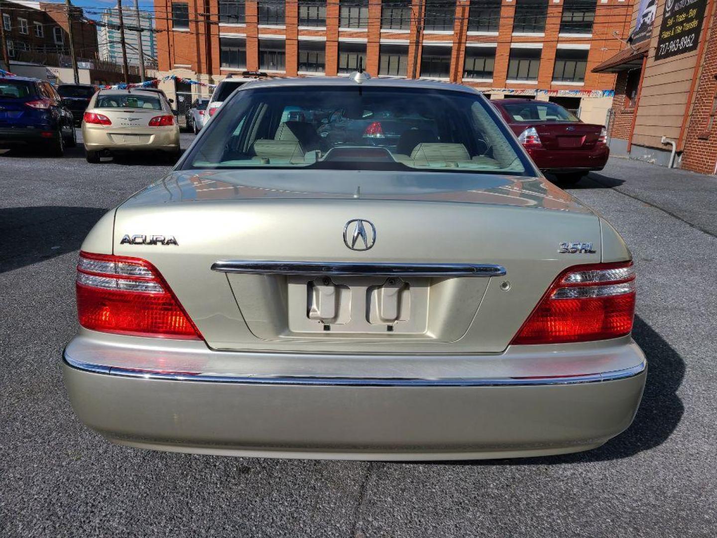 2004 GOLD ACURA 3.5RL SEDAN W/NAV (JH4KA96694C) with an 3.5L engine, Automatic transmission, located at 117 North Cameron Street, Harrisburg, PA, 17101, (717) 963-8962, 40.267021, -76.875351 - Photo#5