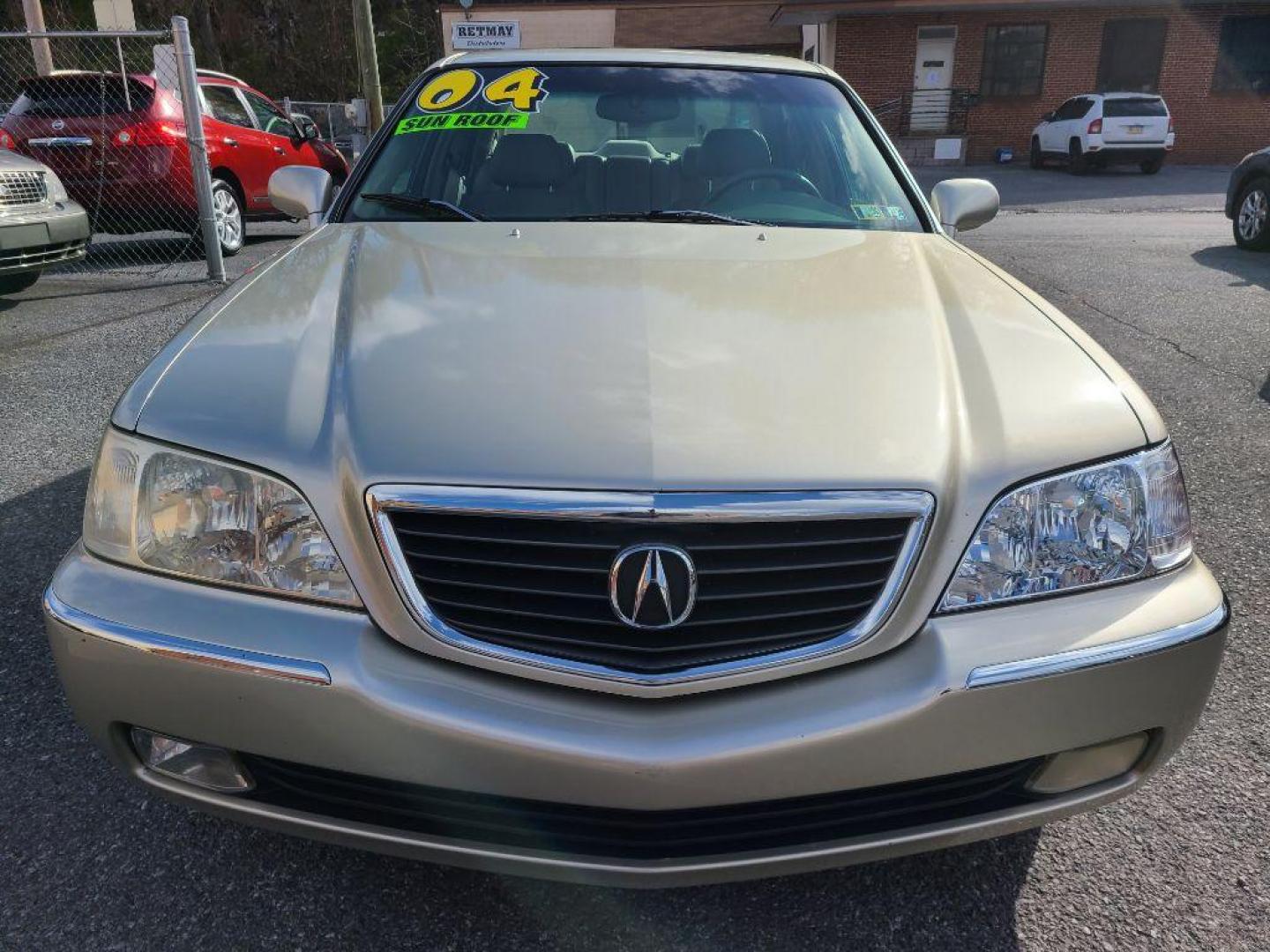 2004 GOLD ACURA 3.5RL SEDAN W/NAV (JH4KA96694C) with an 3.5L engine, Automatic transmission, located at 117 North Cameron Street, Harrisburg, PA, 17101, (717) 963-8962, 40.267021, -76.875351 - Photo#6