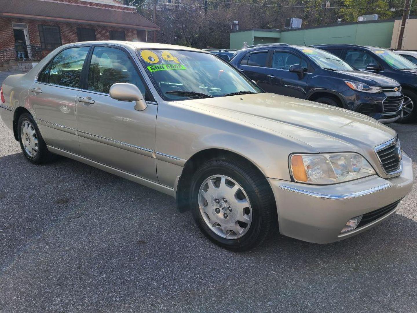 2004 GOLD ACURA 3.5RL SEDAN W/NAV (JH4KA96694C) with an 3.5L engine, Automatic transmission, located at 117 North Cameron Street, Harrisburg, PA, 17101, (717) 963-8962, 40.267021, -76.875351 - Photo#7