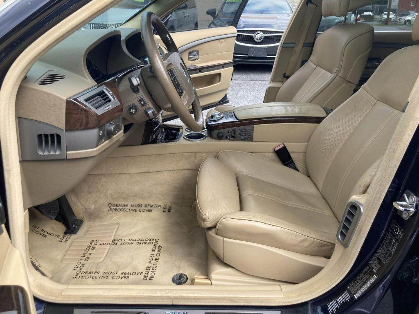 2004 BLACK BMW 745 LI (WBAGN63584D) with an 4.4L engine, Automatic transmission, located at 117 North Cameron Street, Harrisburg, PA, 17101, (717) 963-8962, 40.267021, -76.875351 - WE FINANCE!!! Good Credit/ Bad Credit/ No Credit - ALL Trade-Ins Welcomed!!! ***Guaranteed Credit Approval*** APPLY ONLINE or CALL us TODAY ;) Internet Prices and Marketplace Prices are SPECIAL discounted ***CASH DEALS*** Retail Prices are higher. Please call us to discuss your cash and finan - Photo#11