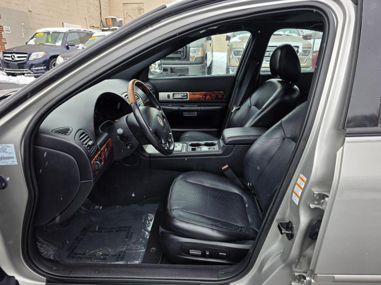 2004 SILVER LINCOLN LS SPORT (1LNHM87A04Y) with an 3.9L engine, Automatic transmission, located at 117 North Cameron Street, Harrisburg, PA, 17101, (717) 963-8962, 40.267021, -76.875351 - WE FINANCE!!! Good Credit/ Challenged Credit/ No Credit - ALL Trade-Ins Welcomed!!! APPLY ONLINE or CALL us TODAY ;) Please call us to discuss your cash and/or financing options. - Photo#8
