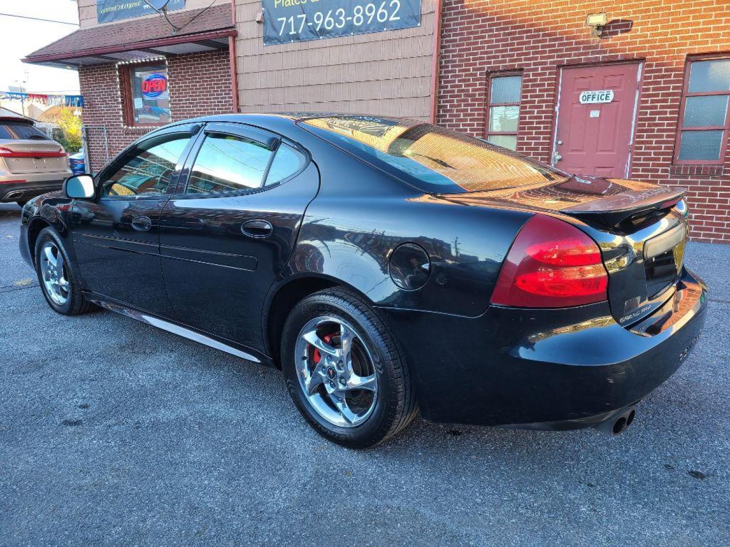 2004 BLACK PONTIAC GRAND PRIX GTP (2G2WR524741) with an 3.8L engine, Automatic transmission, located at 117 North Cameron Street, Harrisburg, PA, 17101, (717) 963-8962, 40.267021, -76.875351 - WE FINANCE!!! Good Credit/ Bad Credit/ No Credit - ALL Trade-Ins Welcomed!!! ***Guaranteed Credit Approval*** APPLY ONLINE or CALL us TODAY ;) Internet Prices and Marketplace Prices are SPECIAL discounted ***CASH DEALS*** Retail Prices are higher. Please call us to discuss your cash and finan - Photo#2