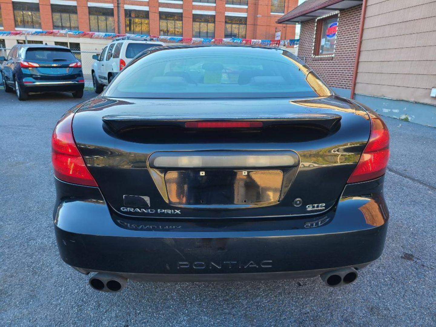 2004 BLACK PONTIAC GRAND PRIX GTP (2G2WR524741) with an 3.8L engine, Automatic transmission, located at 117 North Cameron Street, Harrisburg, PA, 17101, (717) 963-8962, 40.267021, -76.875351 - WE FINANCE!!! Good Credit/ Bad Credit/ No Credit - ALL Trade-Ins Welcomed!!! ***Guaranteed Credit Approval*** APPLY ONLINE or CALL us TODAY ;) Internet Prices and Marketplace Prices are SPECIAL discounted ***CASH DEALS*** Retail Prices are higher. Please call us to discuss your cash and finan - Photo#3