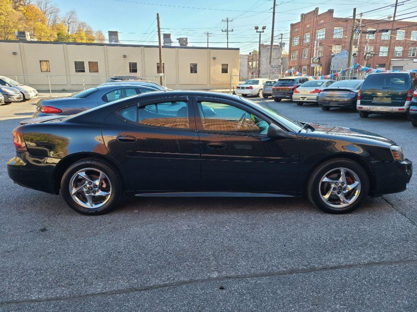 2004 BLACK PONTIAC GRAND PRIX GTP (2G2WR524741) with an 3.8L engine, Automatic transmission, located at 117 North Cameron Street, Harrisburg, PA, 17101, (717) 963-8962, 40.267021, -76.875351 - WE FINANCE!!! Good Credit/ Bad Credit/ No Credit - ALL Trade-Ins Welcomed!!! ***Guaranteed Credit Approval*** APPLY ONLINE or CALL us TODAY ;) Internet Prices and Marketplace Prices are SPECIAL discounted ***CASH DEALS*** Retail Prices are higher. Please call us to discuss your cash and finan - Photo#5