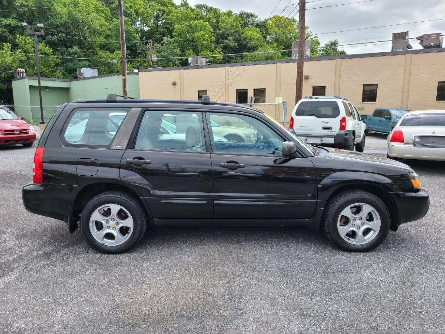 2004 BLACK SUBARU FORESTER 2.5XS (JF1SG65664H) with an 2.5L engine, Automatic transmission, located at 117 North Cameron Street, Harrisburg, PA, 17101, (717) 963-8962, 40.267021, -76.875351 - WE FINANCE!!! Good Credit/ Bad Credit/ No Credit - ALL Trade-Ins Welcomed!!! ***Guaranteed Credit Approval*** APPLY ONLINE or CALL us TODAY ;) Internet Prices and Marketplace Prices are SPECIAL discounted ***CASH DEALS*** Retail Prices are higher. Please call us to discuss your cash and finan - Photo#5