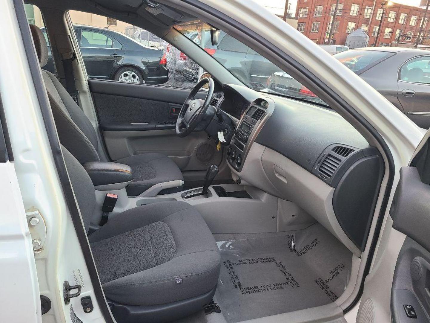 2005 WHITE KIA SPECTRA5 5-DR HB (KNAFE161655) with an 2.0L engine, Automatic transmission, located at 117 North Cameron Street, Harrisburg, PA, 17101, (717) 963-8962, 40.267021, -76.875351 - WE FINANCE!!! Good Credit/ Bad Credit/ No Credit - ALL Trade-Ins Welcomed!!! ***Guaranteed Credit Approval*** APPLY ONLINE or CALL us TODAY ;) Internet Prices and Marketplace Prices are SPECIAL discounted ***CASH DEALS*** Retail Prices are higher. Please call us to discuss your cash and finan - Photo#8