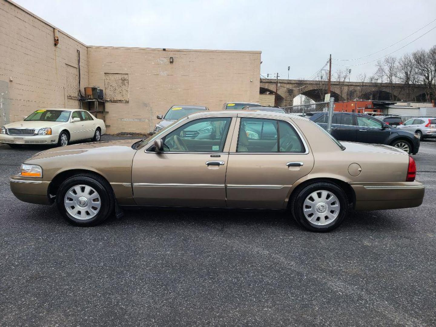 2005 GOLD MERCURY GRAND MARQUIS LS (2MEFM75W85X) with an 4.6L engine, Automatic transmission, located at 117 North Cameron Street, Harrisburg, PA, 17101, (717) 963-8962, 40.267021, -76.875351 - WE FINANCE!!! Good Credit/ Bad Credit/ No Credit - ALL Trade-Ins Welcomed!!! ***Guaranteed Credit Approval*** APPLY ONLINE or CALL us TODAY ;) Internet Prices and Marketplace Prices are SPECIAL discounted ***CASH DEALS*** Retail Prices are higher. Please call us to discuss your cash and finan - Photo#1