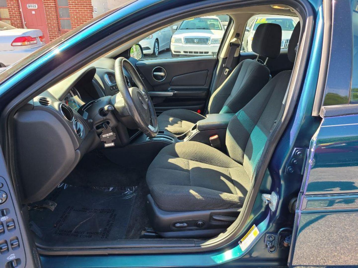2006 GREEN PONTIAC GRAND PRIX BASE (2G2WP552561) with an 3.8L engine, Automatic transmission, located at 117 North Cameron Street, Harrisburg, PA, 17101, (717) 963-8962, 40.267021, -76.875351 - Photo#12