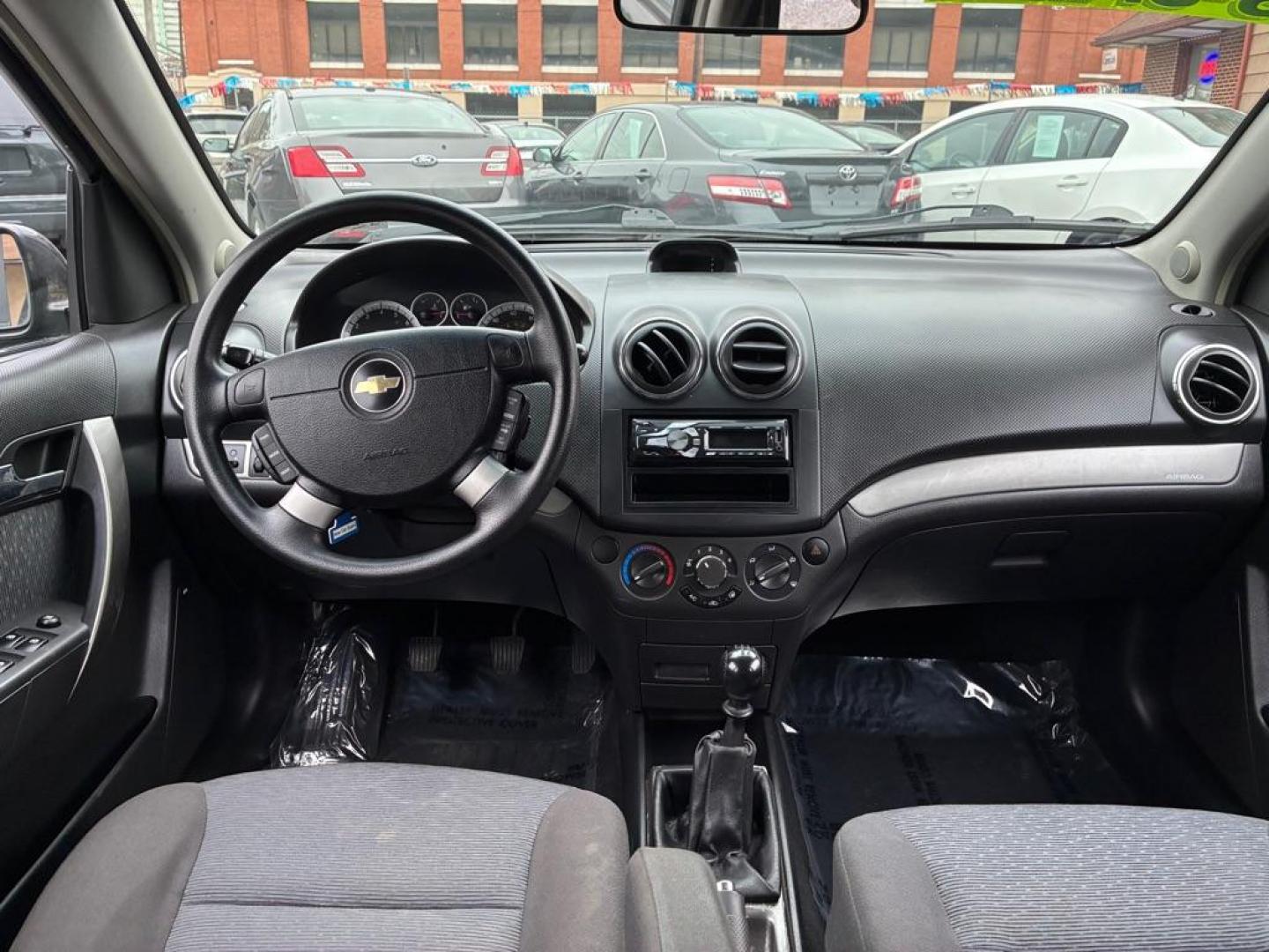 2007 BLACK CHEVROLET AVEO LT (KL1TG56647B) with an 1.6L engine, Automatic transmission, located at 117 North Cameron Street, Harrisburg, PA, 17101, (717) 963-8962, 40.267021, -76.875351 - WE FINANCE!!! Good Credit/ Challenged Credit/ No Credit - ALL Trade-Ins Welcomed!!! APPLY ONLINE or CALL us TODAY ;) Please call us to discuss your cash and/or financing options. - Photo#12