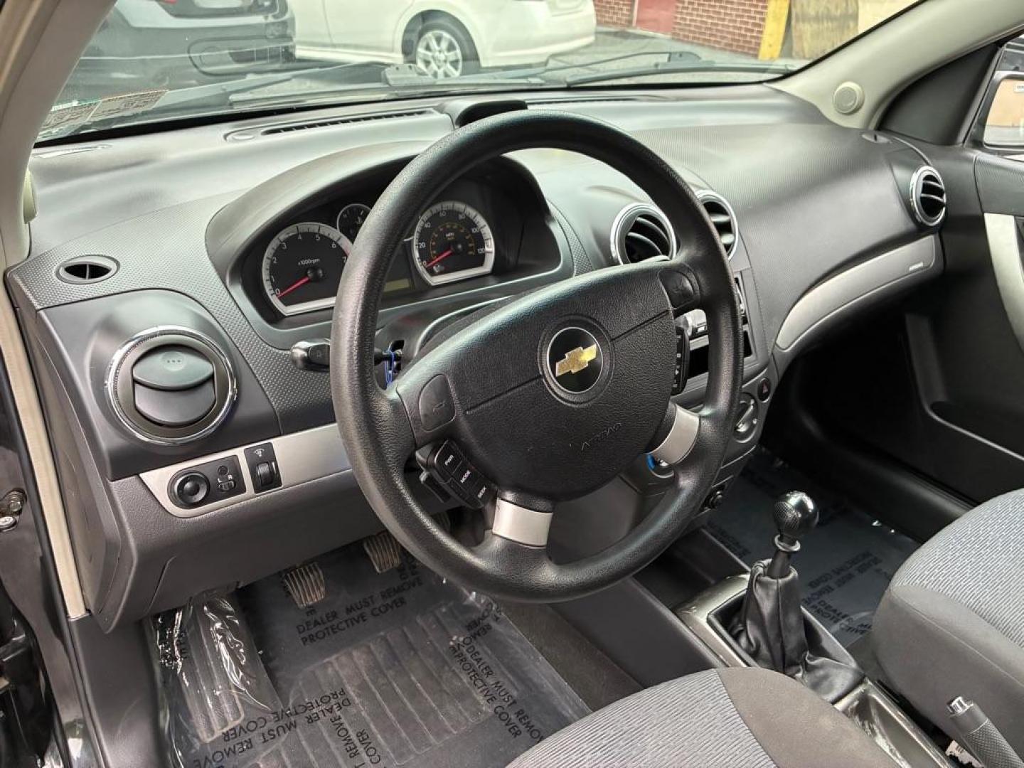 2007 BLACK CHEVROLET AVEO LT (KL1TG56647B) with an 1.6L engine, Automatic transmission, located at 117 North Cameron Street, Harrisburg, PA, 17101, (717) 963-8962, 40.267021, -76.875351 - WE FINANCE!!! Good Credit/ Challenged Credit/ No Credit - ALL Trade-Ins Welcomed!!! APPLY ONLINE or CALL us TODAY ;) Please call us to discuss your cash and/or financing options. - Photo#14