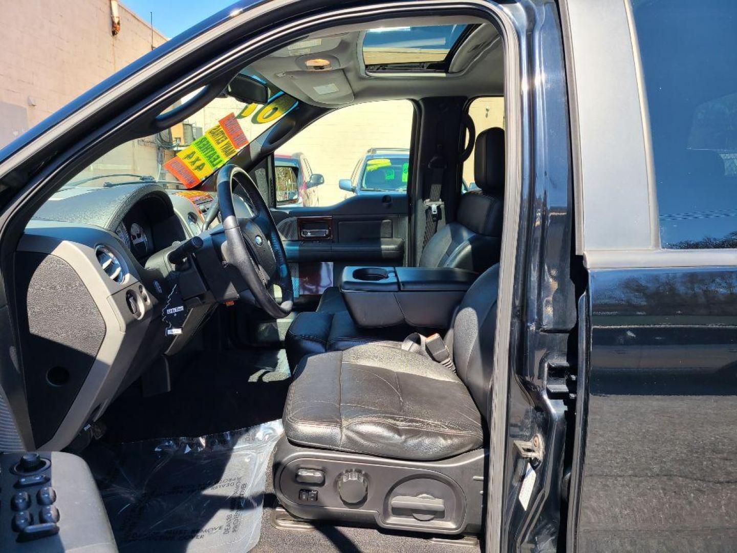 2007 BLACK FORD F150 LARIAT SUPERCREW (1FTPW14V97F) with an 5.4L engine, Automatic transmission, located at 117 North Cameron Street, Harrisburg, PA, 17101, (717) 963-8962, 40.267021, -76.875351 - WE FINANCE!!! Good Credit/ Bad Credit/ No Credit - ALL Trade-Ins Welcomed!!! ***Guaranteed Credit Approval*** APPLY ONLINE or CALL us TODAY ;) Internet Prices and Marketplace Prices are SPECIAL discounted ***CASH DEALS*** Retail Prices are higher. Please call us to discuss your cash and finan - Photo#16