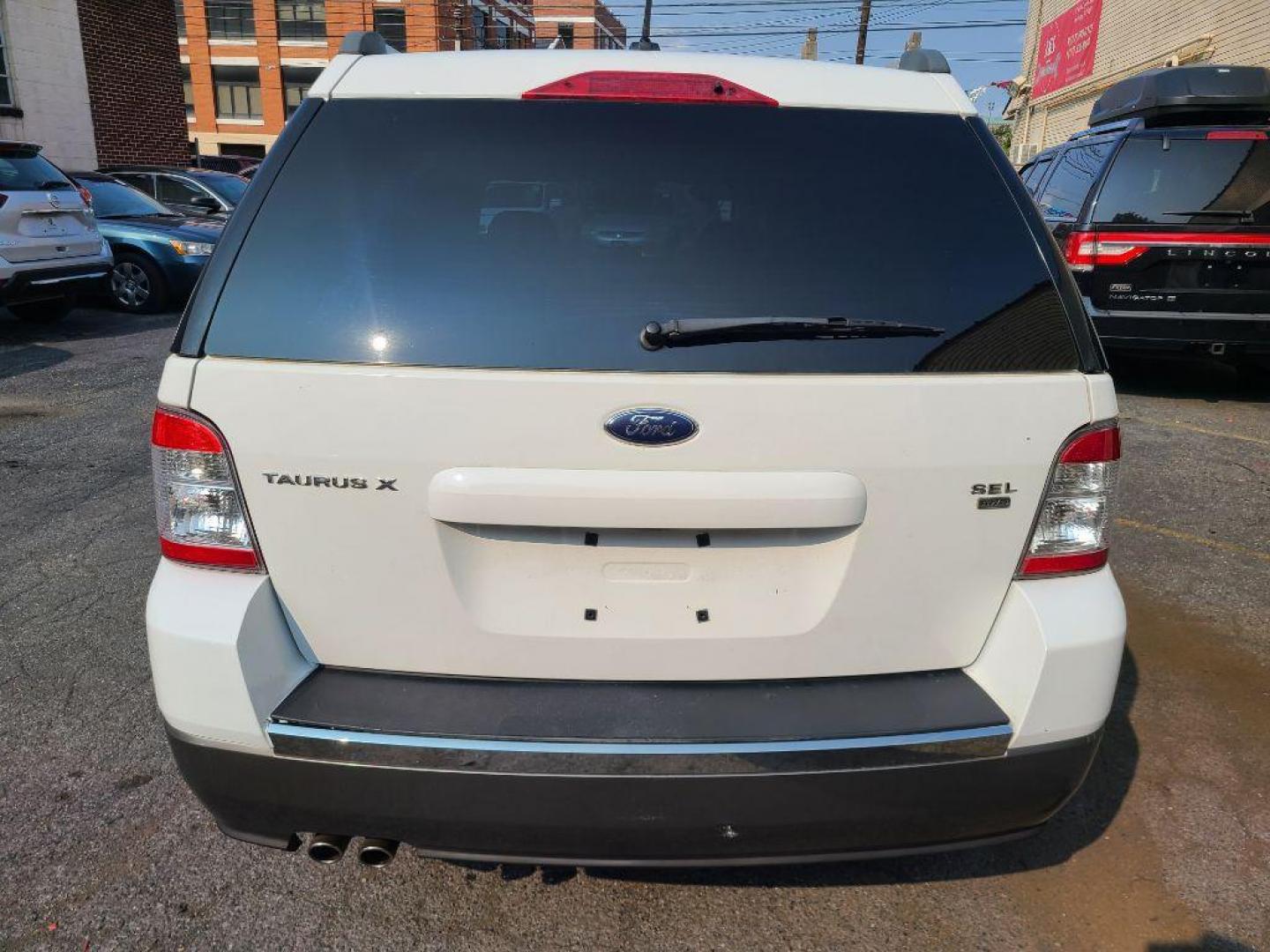 2008 WHITE FORD TAURUS X SEL (1FMDK05W08G) with an 3.5L engine, Automatic transmission, located at 117 North Cameron Street, Harrisburg, PA, 17101, (717) 963-8962, 40.267021, -76.875351 - WE FINANCE!!! Good Credit/ Bad Credit/ No Credit - ALL Trade-Ins Welcomed!!! ***Guaranteed Credit Approval*** APPLY ONLINE or CALL us TODAY ;) Internet Prices and Marketplace Prices are SPECIAL discounted ***CASH DEALS*** Retail Prices are higher. Please call us to discuss your cash and finan - Photo#2