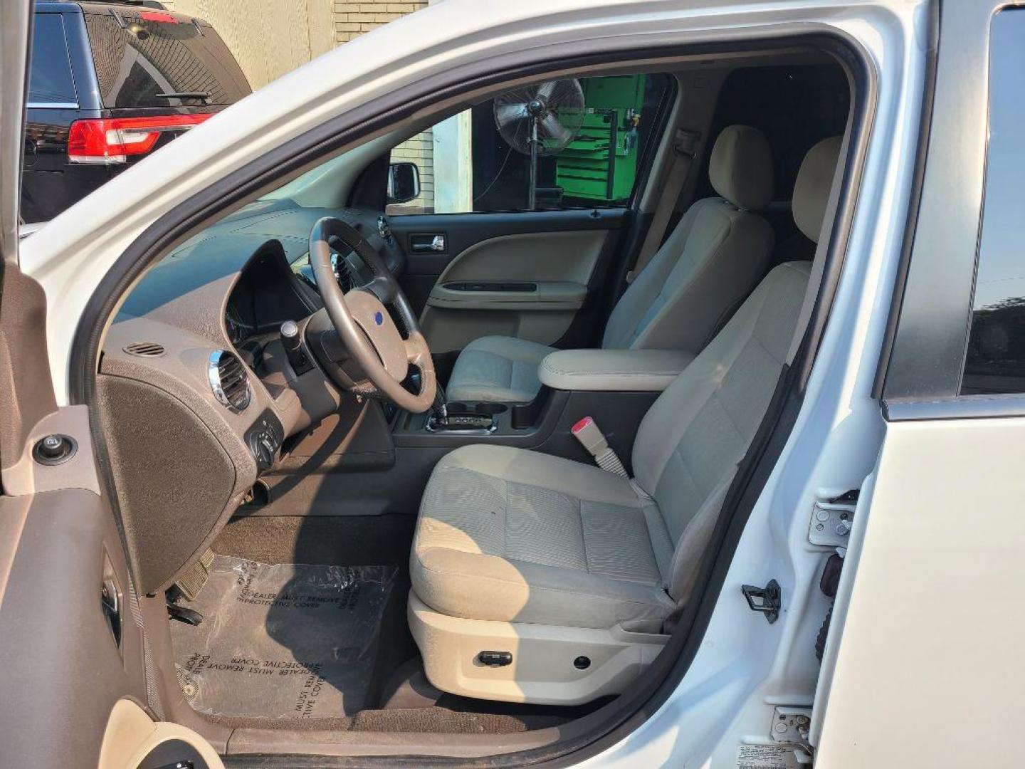 2008 WHITE FORD TAURUS X SEL (1FMDK05W08G) with an 3.5L engine, Automatic transmission, located at 117 North Cameron Street, Harrisburg, PA, 17101, (717) 963-8962, 40.267021, -76.875351 - WE FINANCE!!! Good Credit/ Bad Credit/ No Credit - ALL Trade-Ins Welcomed!!! ***Guaranteed Credit Approval*** APPLY ONLINE or CALL us TODAY ;) Internet Prices and Marketplace Prices are SPECIAL discounted ***CASH DEALS*** Retail Prices are higher. Please call us to discuss your cash and finan - Photo#15