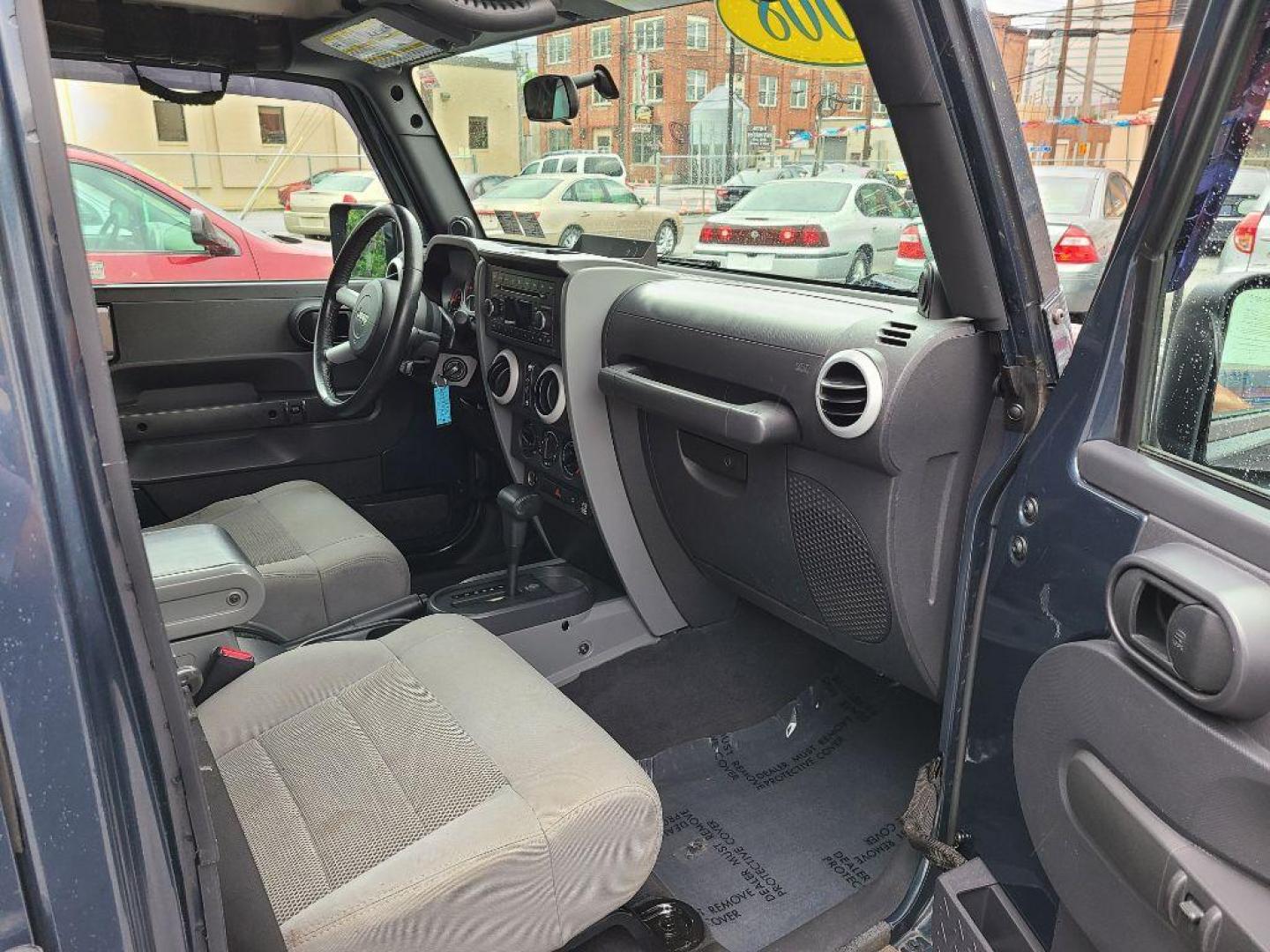 2008 BLUE JEEP WRANGLER UNLIMI SAHARA (1J4GA59118L) with an 3.8L engine, Automatic transmission, located at 117 North Cameron Street, Harrisburg, PA, 17101, (717) 963-8962, 40.267021, -76.875351 - WE FINANCE!!! Good Credit/ Bad Credit/ No Credit - ALL Trade-Ins Welcomed!!! ***Guaranteed Credit Approval*** APPLY ONLINE or CALL us TODAY ;) Internet Prices and Marketplace Prices are SPECIAL discounted ***CASH DEALS*** Retail Prices are higher. Please call us to discuss your cash and finan - Photo#16