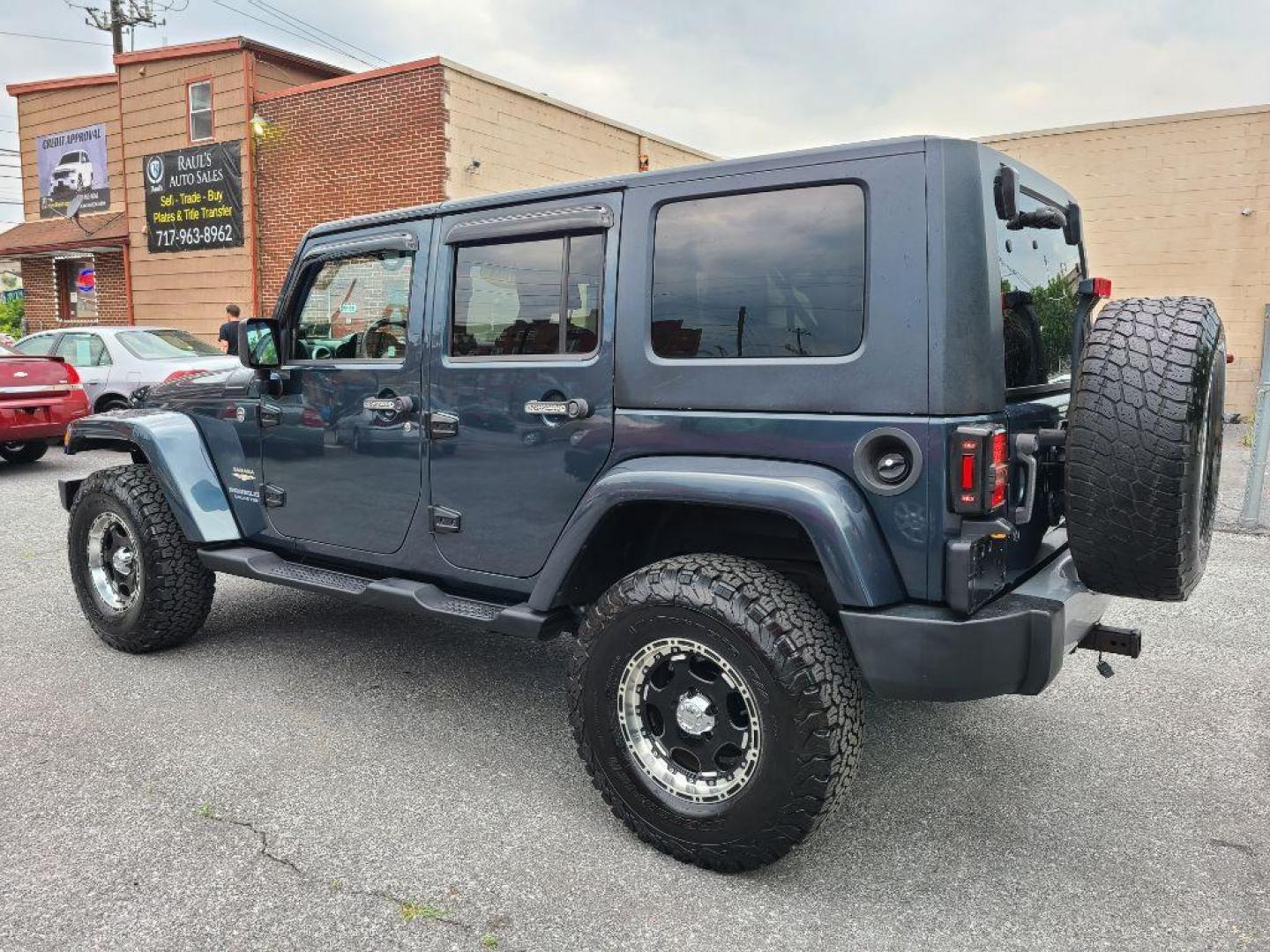2008 BLUE JEEP WRANGLER UNLIMI SAHARA (1J4GA59118L) with an 3.8L engine, Automatic transmission, located at 117 North Cameron Street, Harrisburg, PA, 17101, (717) 963-8962, 40.267021, -76.875351 - WE FINANCE!!! Good Credit/ Bad Credit/ No Credit - ALL Trade-Ins Welcomed!!! ***Guaranteed Credit Approval*** APPLY ONLINE or CALL us TODAY ;) Internet Prices and Marketplace Prices are SPECIAL discounted ***CASH DEALS*** Retail Prices are higher. Please call us to discuss your cash and finan - Photo#2