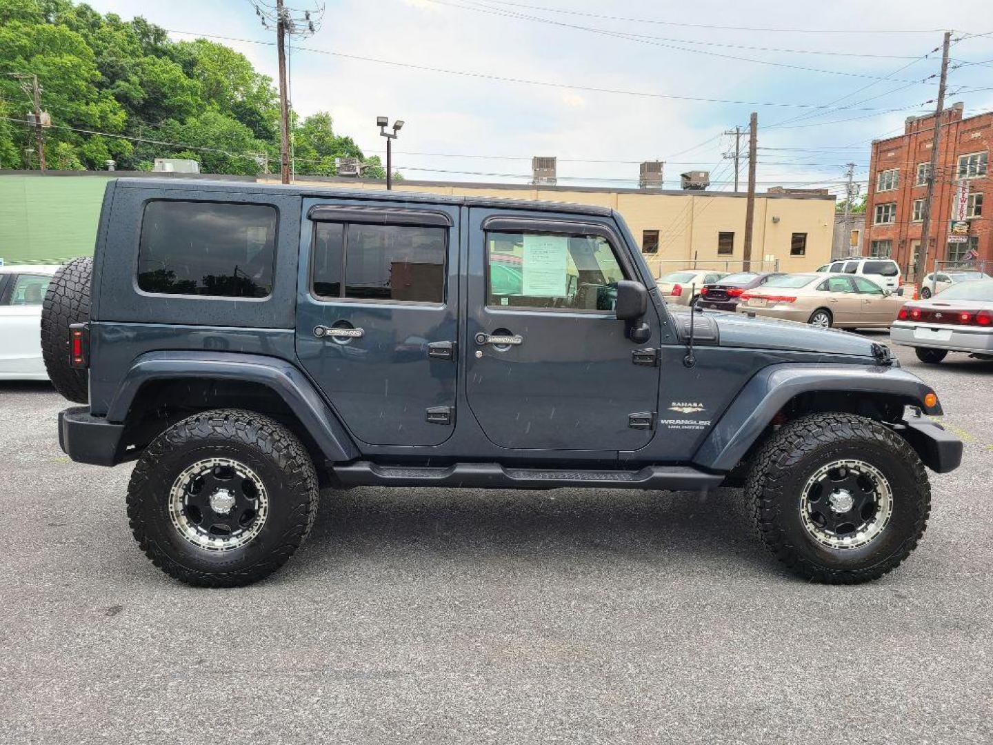 2008 BLUE JEEP WRANGLER UNLIMI SAHARA (1J4GA59118L) with an 3.8L engine, Automatic transmission, located at 117 North Cameron Street, Harrisburg, PA, 17101, (717) 963-8962, 40.267021, -76.875351 - WE FINANCE!!! Good Credit/ Bad Credit/ No Credit - ALL Trade-Ins Welcomed!!! ***Guaranteed Credit Approval*** APPLY ONLINE or CALL us TODAY ;) Internet Prices and Marketplace Prices are SPECIAL discounted ***CASH DEALS*** Retail Prices are higher. Please call us to discuss your cash and finan - Photo#5