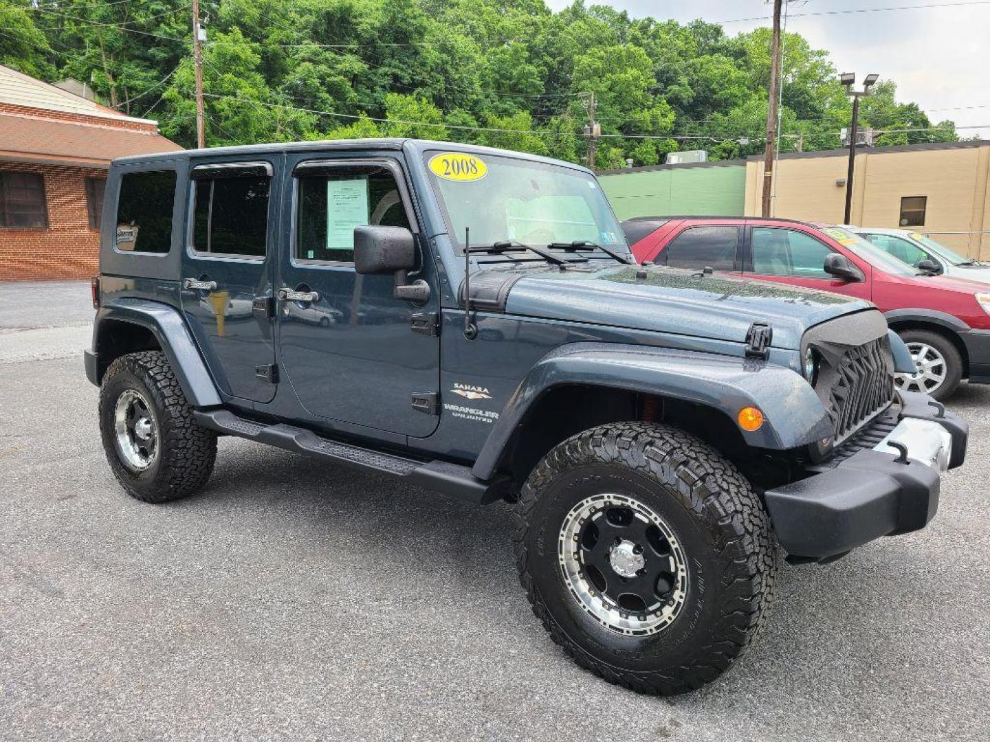 2008 BLUE JEEP WRANGLER UNLIMI SAHARA (1J4GA59118L) with an 3.8L engine, Automatic transmission, located at 117 North Cameron Street, Harrisburg, PA, 17101, (717) 963-8962, 40.267021, -76.875351 - WE FINANCE!!! Good Credit/ Bad Credit/ No Credit - ALL Trade-Ins Welcomed!!! ***Guaranteed Credit Approval*** APPLY ONLINE or CALL us TODAY ;) Internet Prices and Marketplace Prices are SPECIAL discounted ***CASH DEALS*** Retail Prices are higher. Please call us to discuss your cash and finan - Photo#6