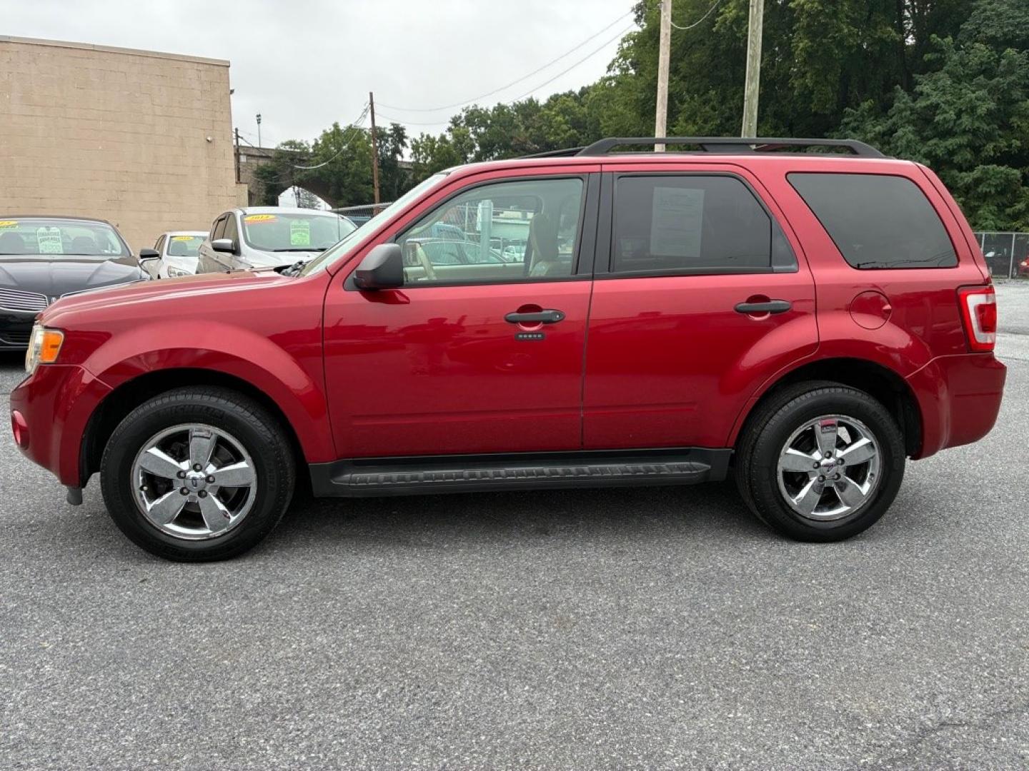 2009 RED FORD ESCAPE XLT (1FMCU93G79K) with an 3.0L engine, Automatic transmission, located at 117 North Cameron Street, Harrisburg, PA, 17101, (717) 963-8962, 40.267021, -76.875351- Photo#1