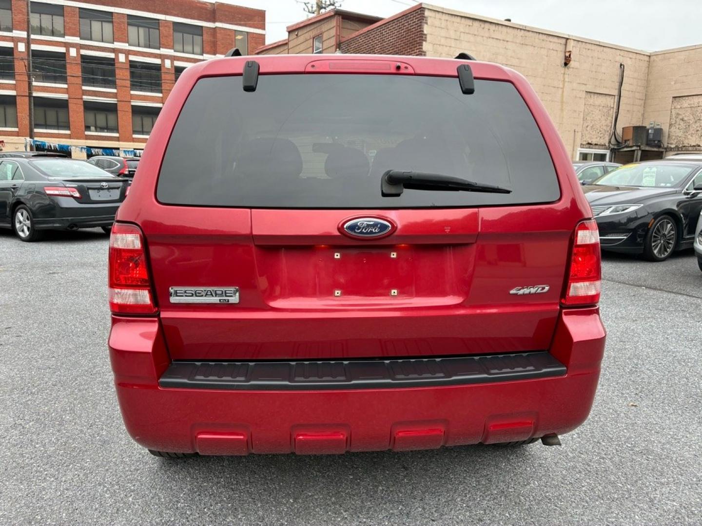 2009 RED FORD ESCAPE XLT (1FMCU93G79K) with an 3.0L engine, Automatic transmission, located at 117 North Cameron Street, Harrisburg, PA, 17101, (717) 963-8962, 40.267021, -76.875351- Photo#3