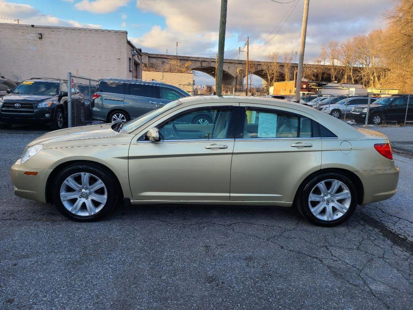 2010 GOLD CHRYSLER SEBRING LIMITED (1C3CC5FVXAN) with an 3.5L engine, Automatic transmission, located at 117 North Cameron Street, Harrisburg, PA, 17101, (717) 963-8962, 40.267021, -76.875351 - WE FINANCE!!! Good Credit/ Bad Credit/ No Credit - ALL Trade-Ins Welcomed!!! ***Guaranteed Credit Approval*** APPLY ONLINE or CALL us TODAY ;) Internet Prices and Marketplace Prices are SPECIAL discounted ***CASH DEALS*** Retail Prices are higher. Please call us to discuss your cash and finan - Photo#1