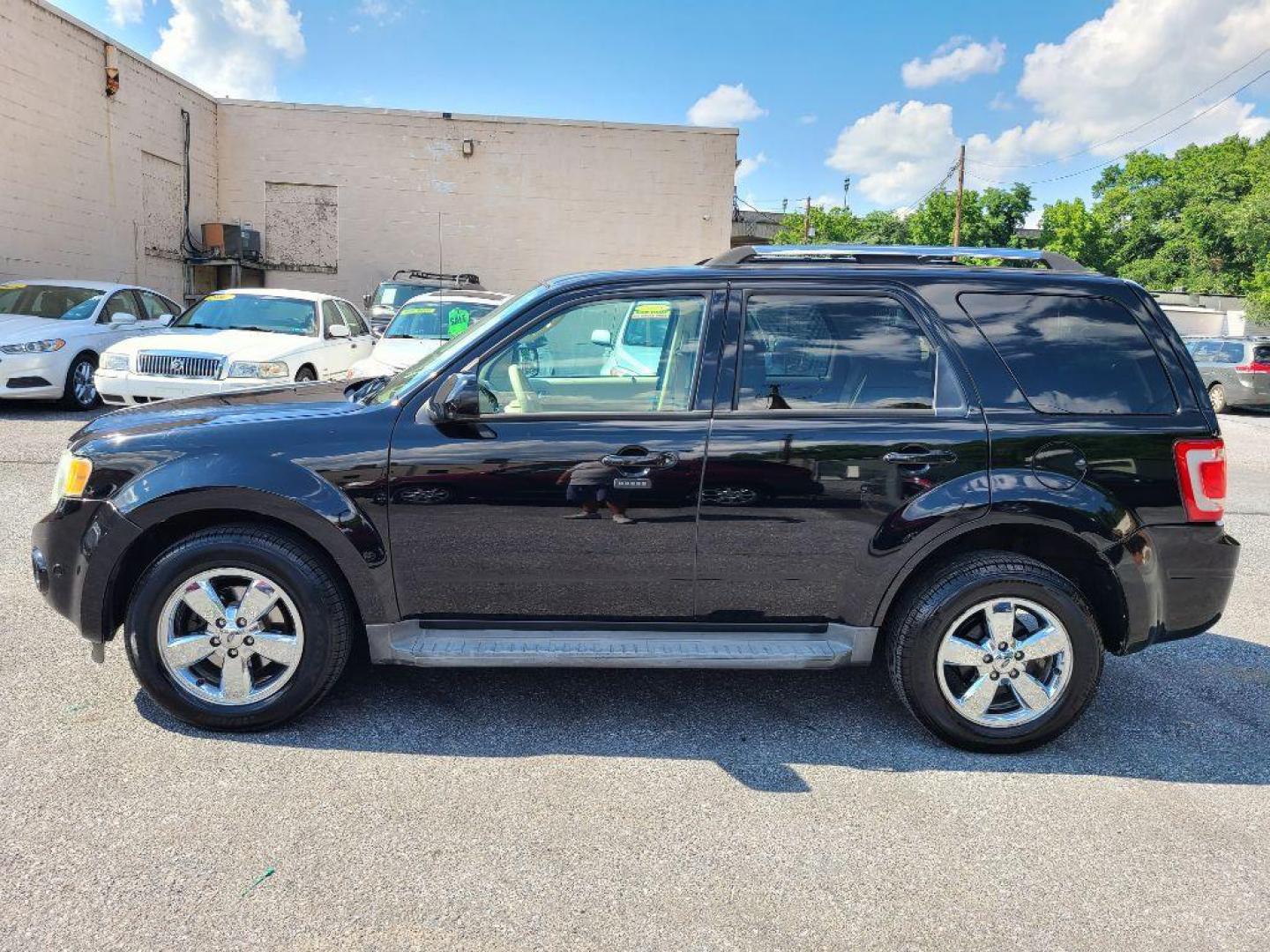 2010 BLACK FORD ESCAPE LIMITED (1FMCU9EG1AK) with an 3.0L engine, Automatic transmission, located at 7981 Paxton Street, Harrisburg, PA, 17111, (717) 561-2926, 40.261490, -76.749229 - Photo#1