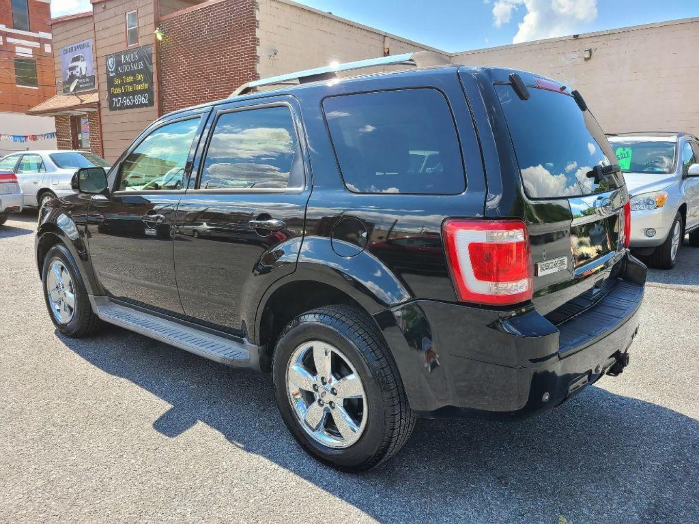 2010 BLACK FORD ESCAPE LIMITED (1FMCU9EG1AK) with an 3.0L engine, Automatic transmission, located at 7981 Paxton Street, Harrisburg, PA, 17111, (717) 561-2926, 40.261490, -76.749229 - Photo#2