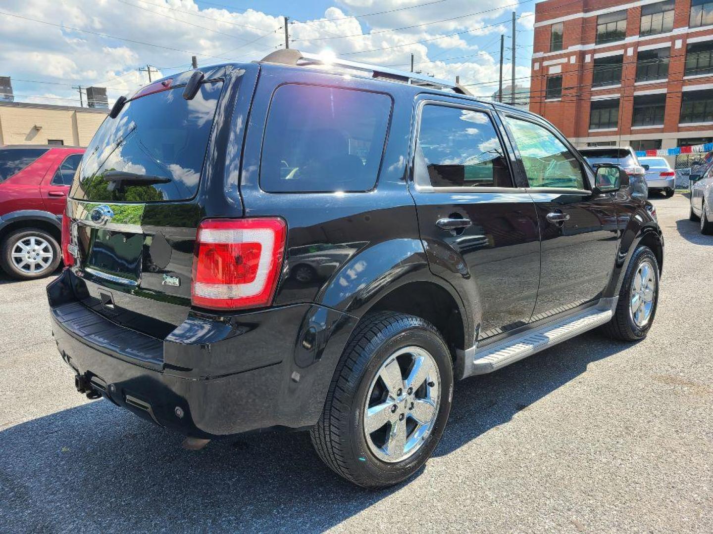 2010 BLACK FORD ESCAPE LIMITED (1FMCU9EG1AK) with an 3.0L engine, Automatic transmission, located at 7981 Paxton Street, Harrisburg, PA, 17111, (717) 561-2926, 40.261490, -76.749229 - Photo#4