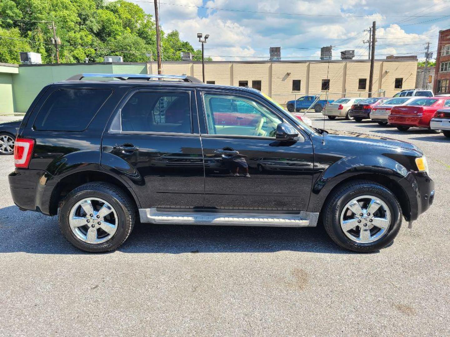2010 BLACK FORD ESCAPE LIMITED (1FMCU9EG1AK) with an 3.0L engine, Automatic transmission, located at 7981 Paxton Street, Harrisburg, PA, 17111, (717) 561-2926, 40.261490, -76.749229 - Photo#5