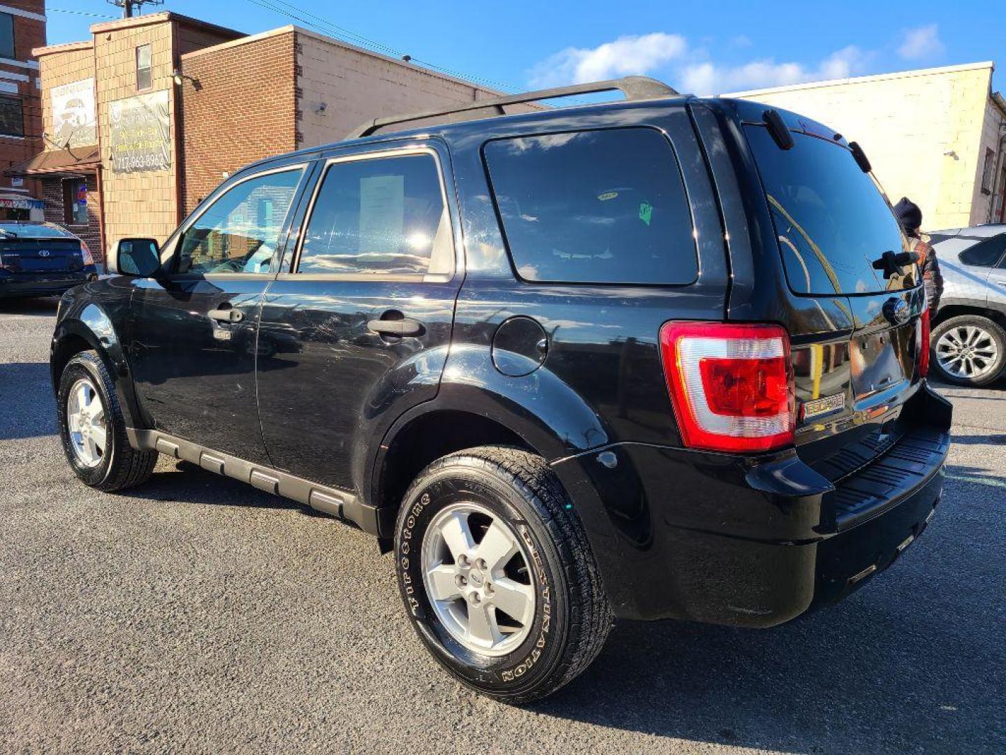 2010 BLACK FORD ESCAPE XLT (1FMCU9D75AK) with an 2.5L engine, Automatic transmission, located at 117 North Cameron Street, Harrisburg, PA, 17101, (717) 963-8962, 40.267021, -76.875351 - WE FINANCE!!! Good Credit/ Bad Credit/ No Credit - ALL Trade-Ins Welcomed!!! ***Guaranteed Credit Approval*** APPLY ONLINE or CALL us TODAY ;) Internet Prices and Marketplace Prices are SPECIAL discounted ***CASH DEALS*** Retail Prices are higher. Please call us to discuss your cash and finan - Photo#2