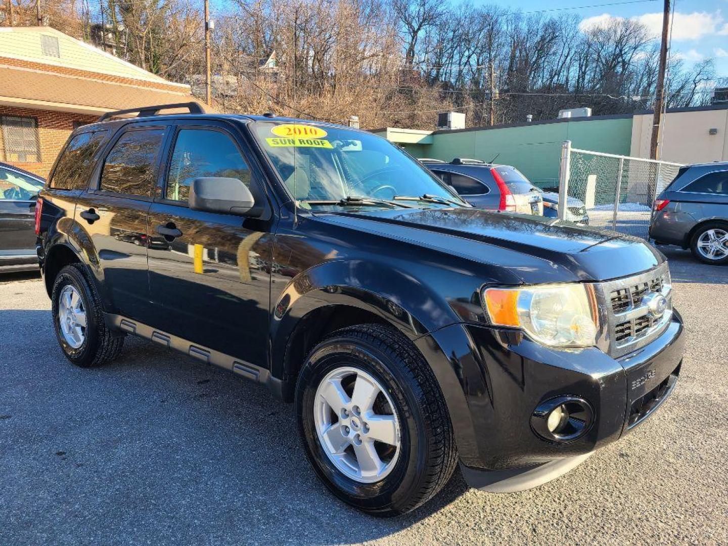2010 BLACK FORD ESCAPE XLT (1FMCU9D75AK) with an 2.5L engine, Automatic transmission, located at 117 North Cameron Street, Harrisburg, PA, 17101, (717) 963-8962, 40.267021, -76.875351 - WE FINANCE!!! Good Credit/ Bad Credit/ No Credit - ALL Trade-Ins Welcomed!!! ***Guaranteed Credit Approval*** APPLY ONLINE or CALL us TODAY ;) Internet Prices and Marketplace Prices are SPECIAL discounted ***CASH DEALS*** Retail Prices are higher. Please call us to discuss your cash and finan - Photo#6