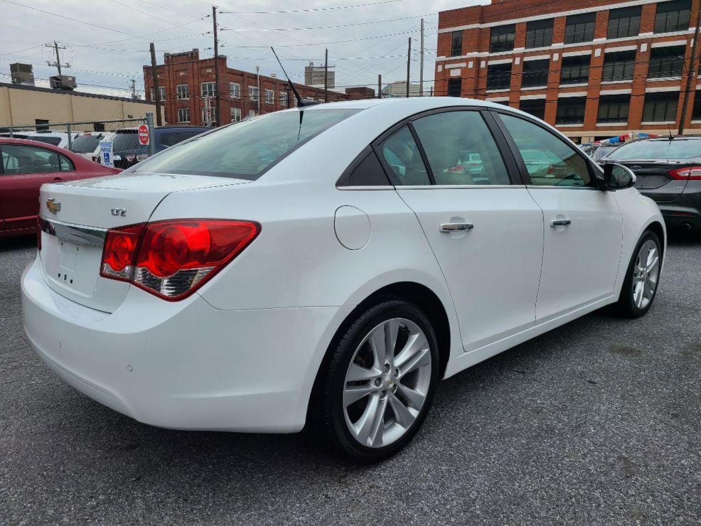 2011 WHITE CHEVROLET CRUZE LTZ (1G1PH5S95B7) with an 1.4L engine, Automatic transmission, located at 117 North Cameron Street, Harrisburg, PA, 17101, (717) 963-8962, 40.267021, -76.875351 - WE FINANCE!!! Good Credit/ Bad Credit/ No Credit - ALL Trade-Ins Welcomed!!! ***Guaranteed Credit Approval*** APPLY ONLINE or CALL us TODAY ;) Internet Prices and Marketplace Prices are SPECIAL discounted ***CASH DEALS*** Retail Prices are higher. Please call us to discuss your cash and finan - Photo#4