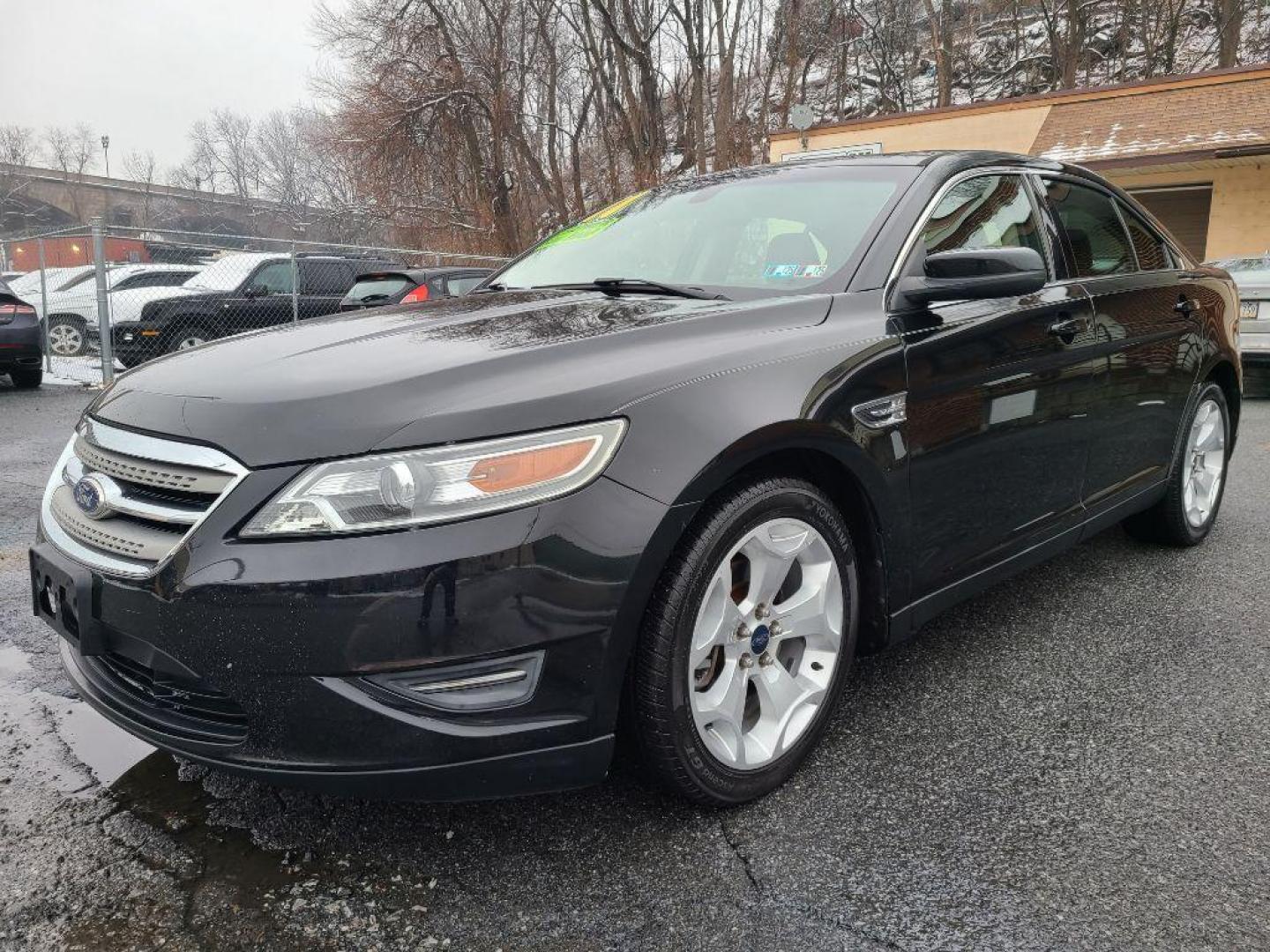 2011 BLACK FORD TAURUS SEL (1FAHP2EW6BG) with an 3.5L engine, Automatic transmission, located at 117 North Cameron Street, Harrisburg, PA, 17101, (717) 963-8962, 40.267021, -76.875351 - Photo#0