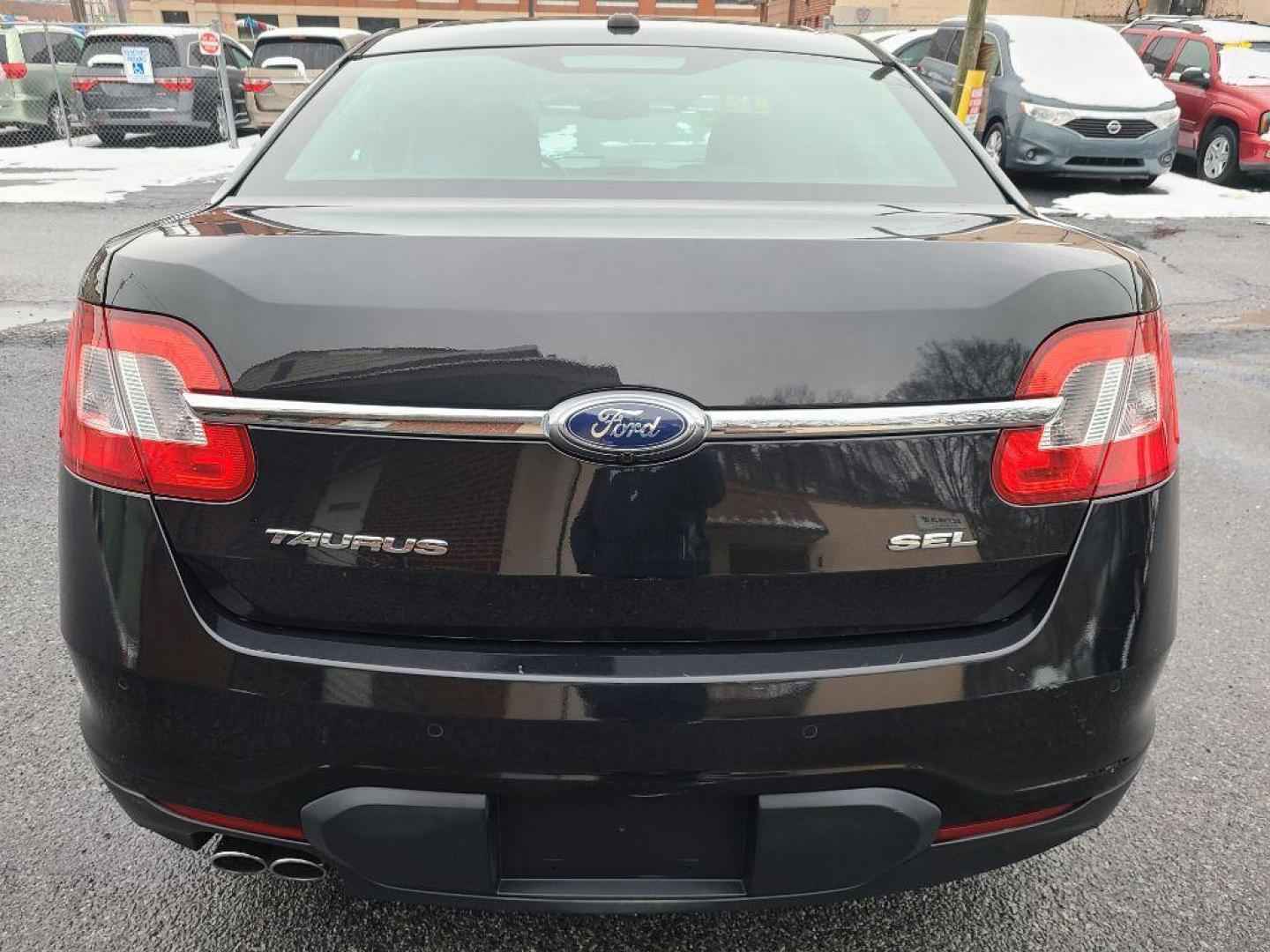 2011 BLACK FORD TAURUS SEL (1FAHP2EW6BG) with an 3.5L engine, Automatic transmission, located at 117 North Cameron Street, Harrisburg, PA, 17101, (717) 963-8962, 40.267021, -76.875351 - Photo#3
