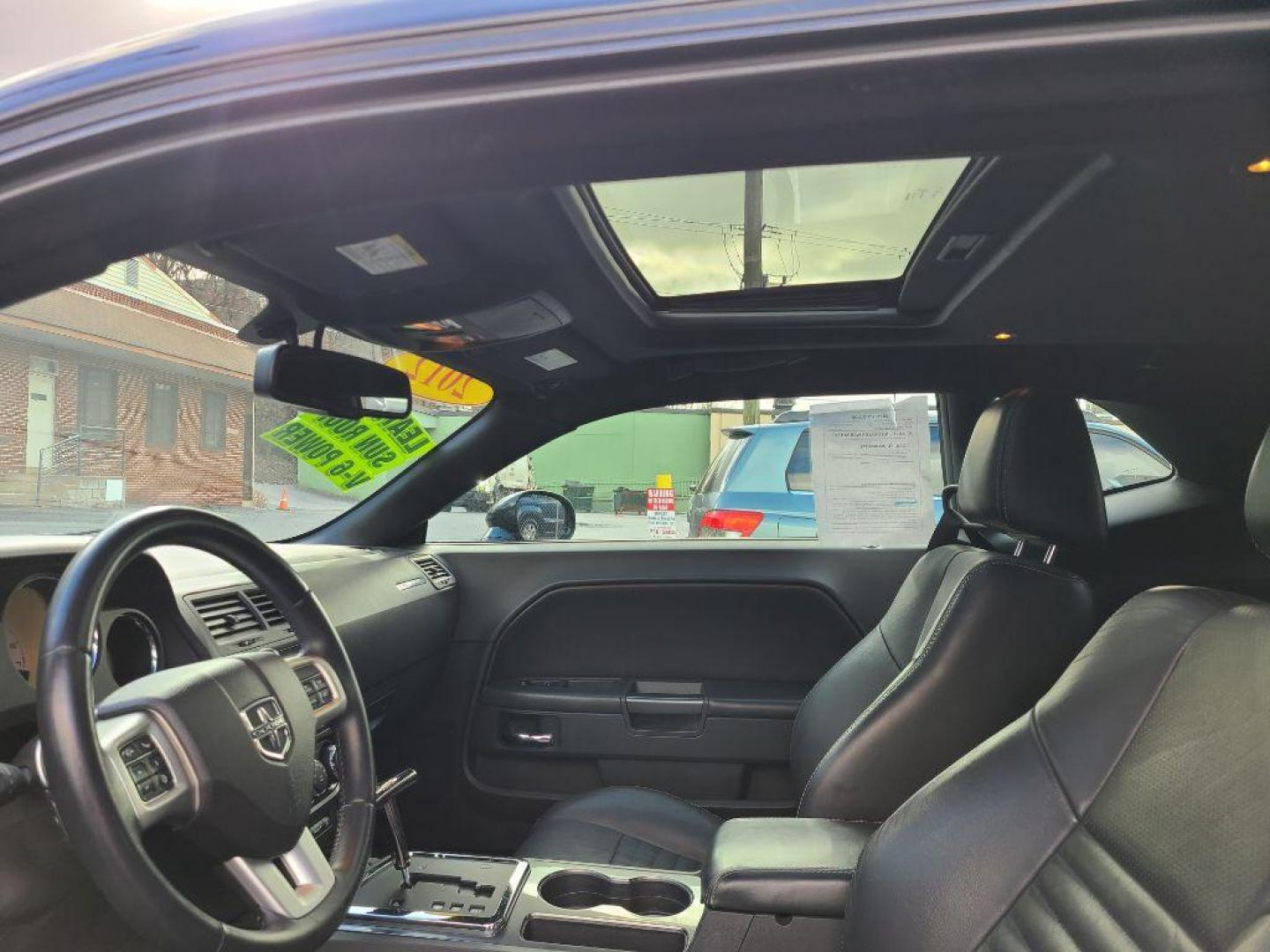 2012 BLACK DODGE CHALLENGER SXT Plus (2C3CDYAG9CH) with an 3.6L engine, Automatic transmission, located at 117 North Cameron Street, Harrisburg, PA, 17101, (717) 963-8962, 40.267021, -76.875351 - WE FINANCE!!! Good Credit/ Bad Credit/ No Credit - ALL Trade-Ins Welcomed!!! ***Guaranteed Credit Approval*** APPLY ONLINE or CALL us TODAY ;) Internet Prices and Marketplace Prices are SPECIAL discounted ***CASH DEALS*** Retail Prices are higher. Please call us to discuss your cash and finan - Photo#10