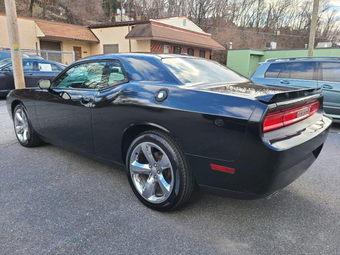 2012 BLACK DODGE CHALLENGER SXT Plus (2C3CDYAG9CH) with an 3.6L engine, Automatic transmission, located at 117 North Cameron Street, Harrisburg, PA, 17101, (717) 963-8962, 40.267021, -76.875351 - WE FINANCE!!! Good Credit/ Bad Credit/ No Credit - ALL Trade-Ins Welcomed!!! ***Guaranteed Credit Approval*** APPLY ONLINE or CALL us TODAY ;) Internet Prices and Marketplace Prices are SPECIAL discounted ***CASH DEALS*** Retail Prices are higher. Please call us to discuss your cash and finan - Photo#4